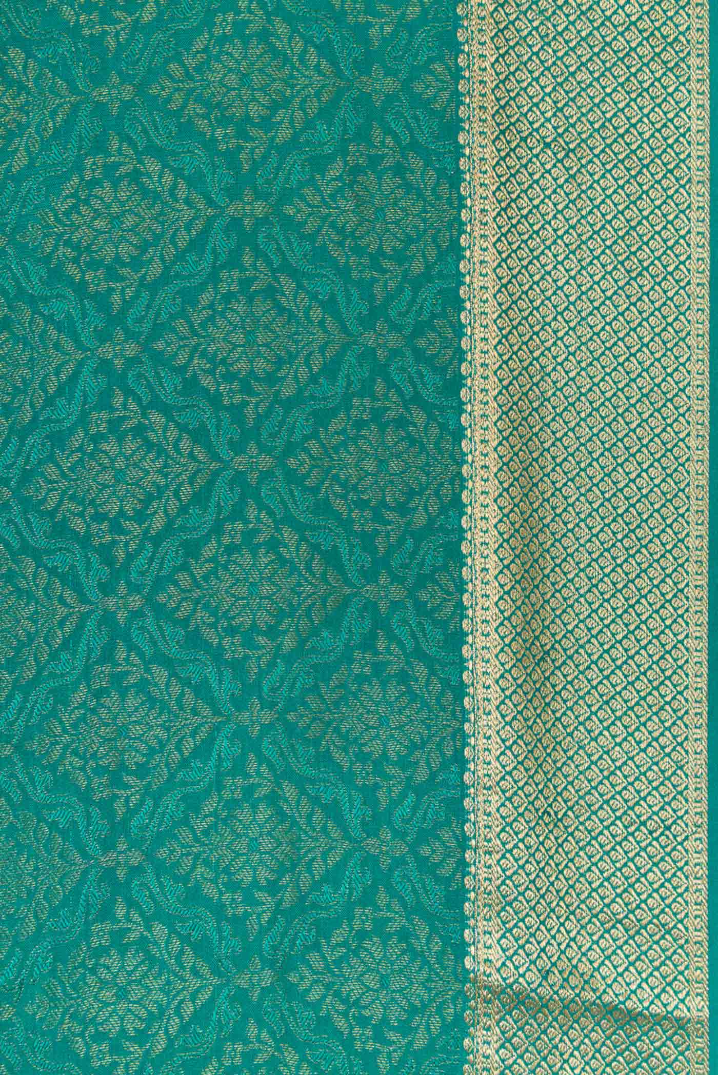 Border image of Peacock Blue Dual Tone Banarasi Georgette Saree with Zari Brocade on the body and Zari Border. 