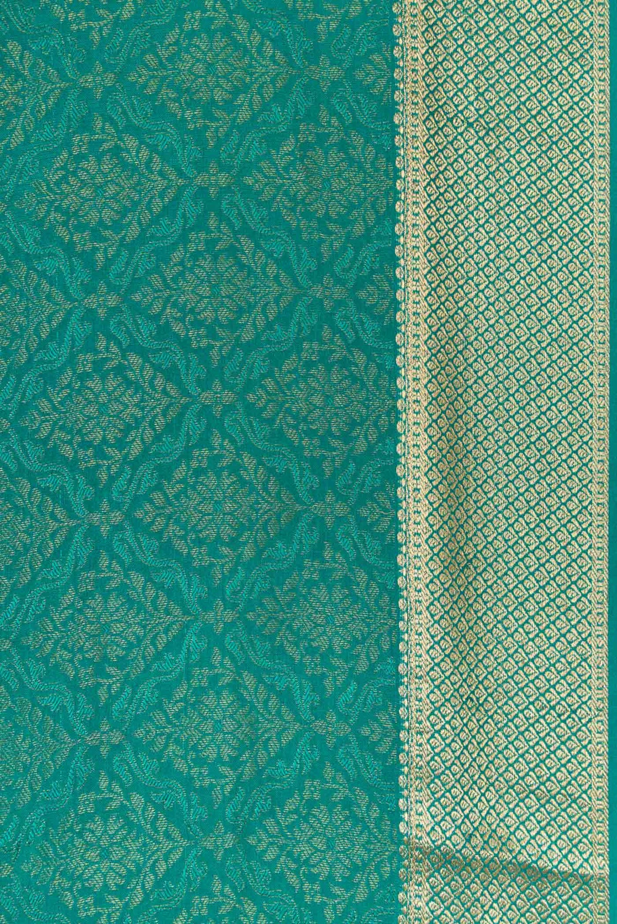 Border image of Peacock Blue Dual Tone Banarasi Georgette Saree with Zari Brocade on the body and Zari Border. 