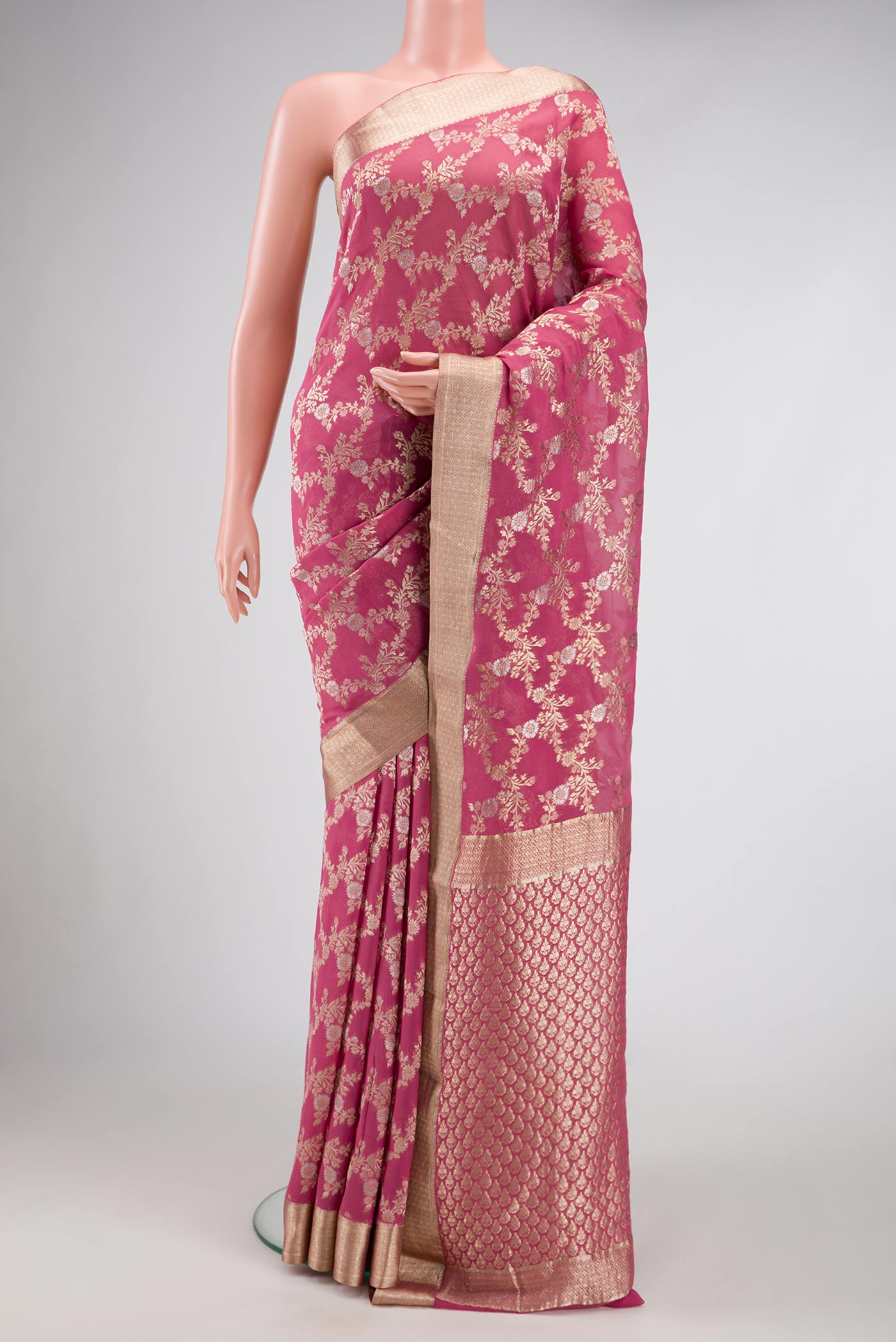 Pink Dual Tone Banarasi Georgette Saree with Zari Brocade on the body and Zari Border.  displayed on a mannequin