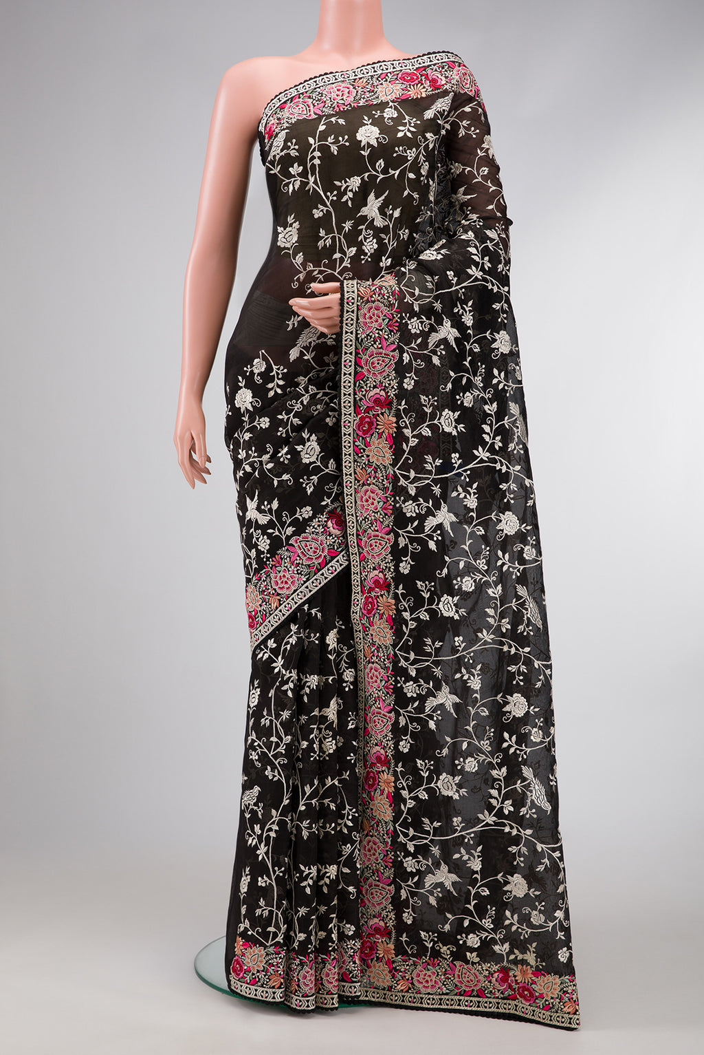 Black Dual Tone Organza Silk Saree with Embroidery on the body and Embroidery Border.  displayed on a mannequin