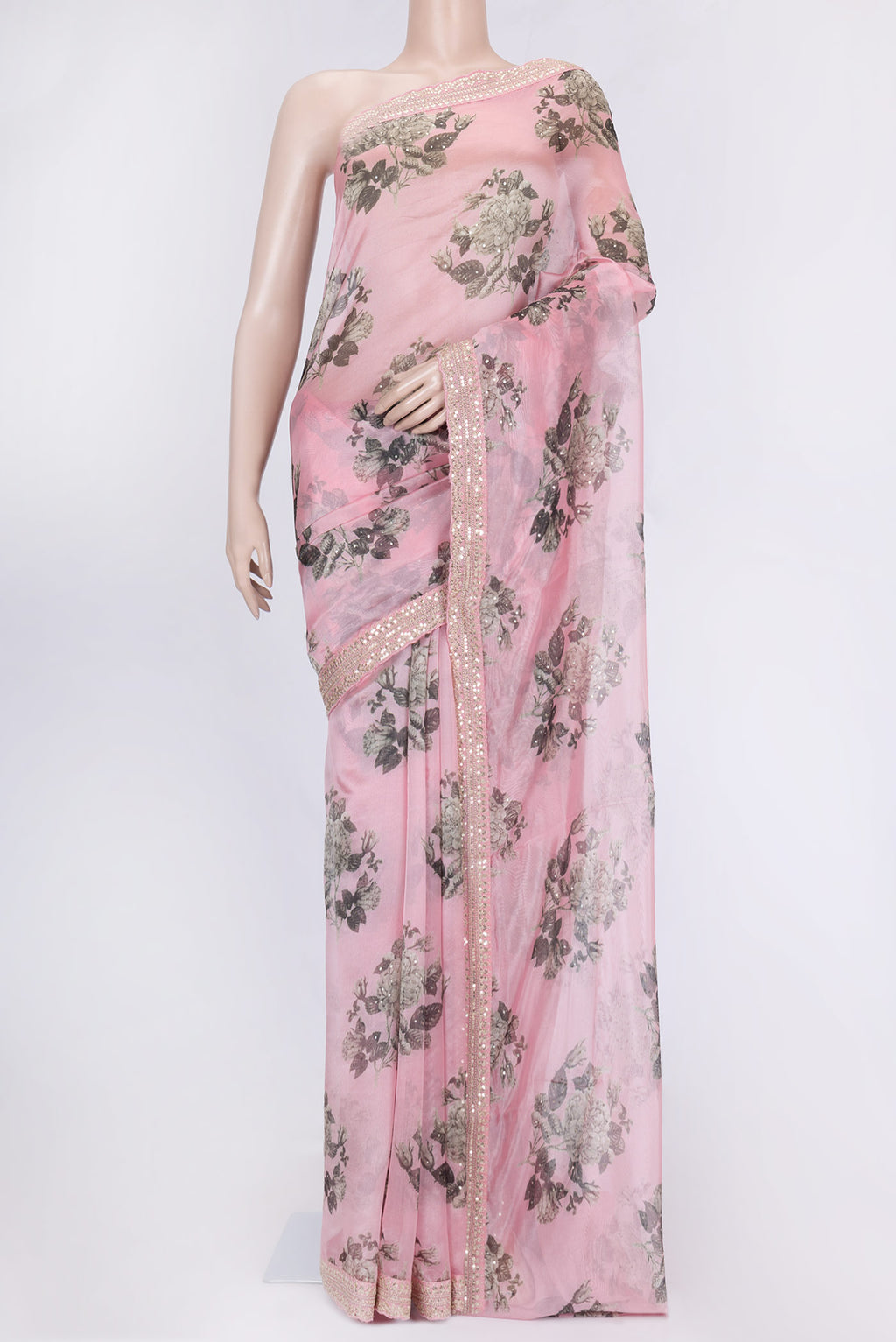 Pink Dual Tone Organza Silk Saree with Printed design on the body and Zari Border.  displayed on a mannequin