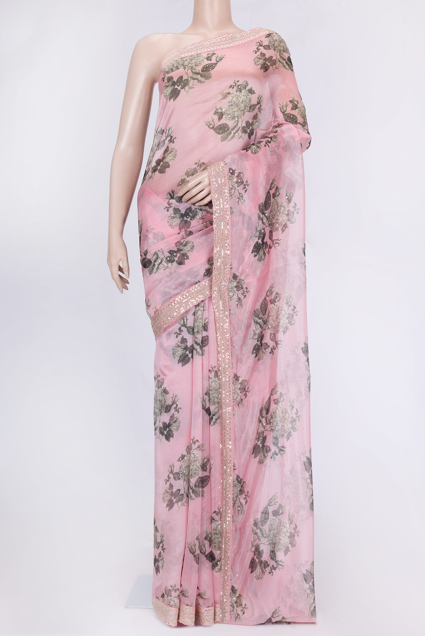 Pink Dual Tone Organza Silk Saree with Printed design on the body and Zari Border.  displayed on a mannequin