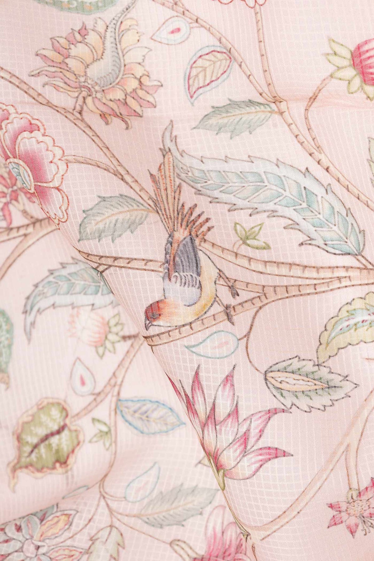 Close up of Golden Peach Dual Tone Kota Silk Saree with Printed design on the body and Embroidery Border displaying folds