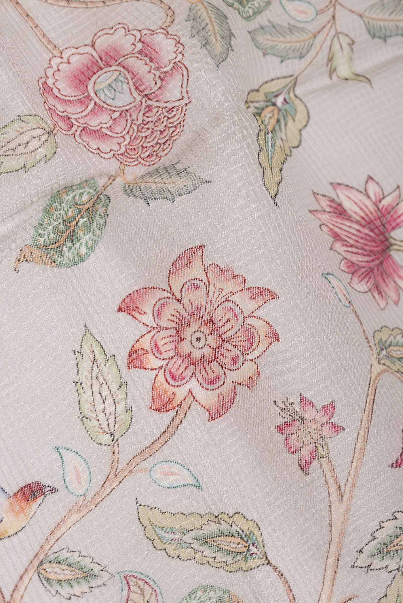 Close up of Grey Dual Tone Kota Silk Saree with Printed design on the body and Embroidery Border displaying folds