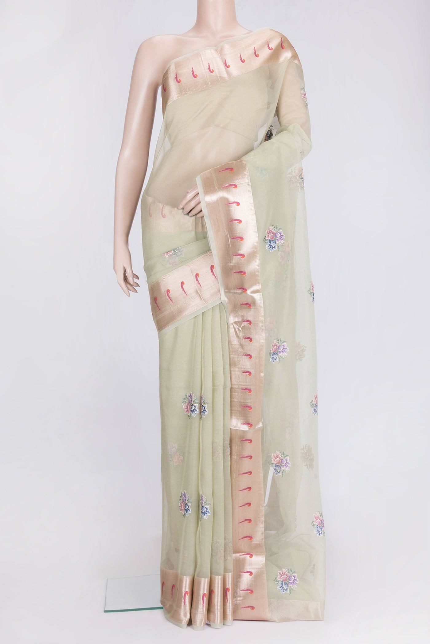 Pista Green Dual Tone Organza Silk Saree with Embroidery on the body and Paithani Border.  displayed on a mannequin
