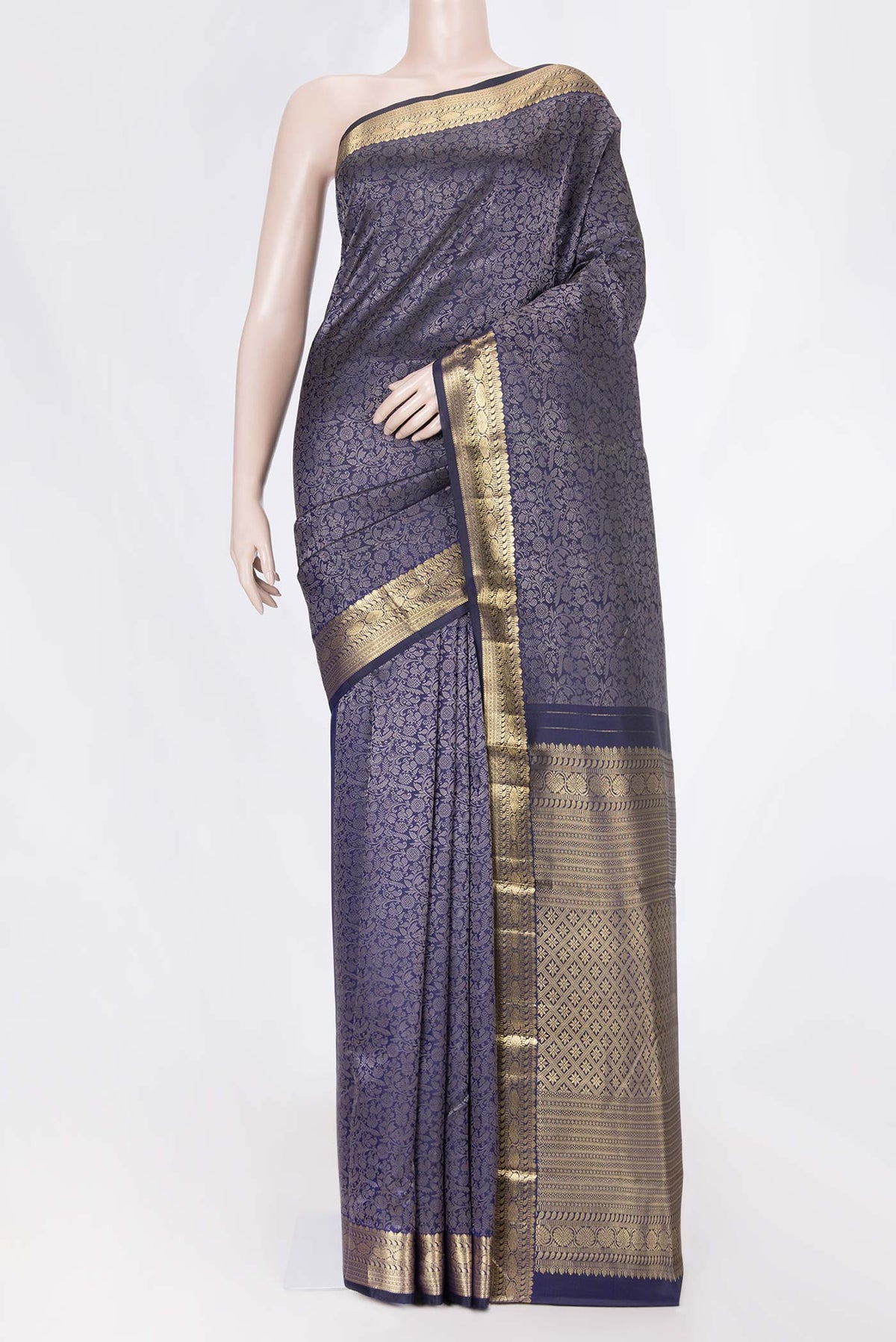 Navy Blue Dual Tone Kanchipuram Saree with Jacquard design on the body and Zari Border displayed on a mannequin