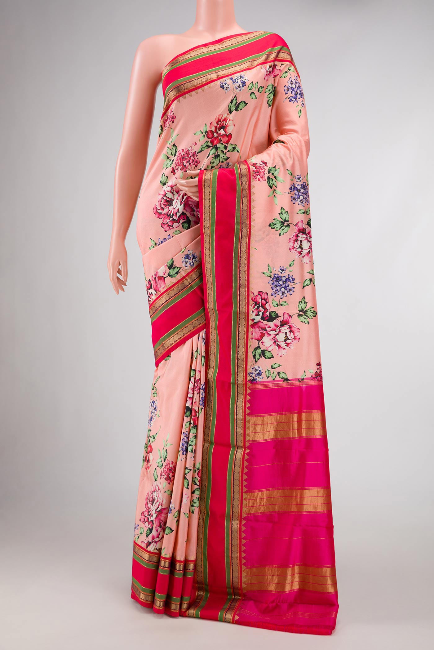 Pink Dual Tone Kanchipuram Silk Saree with Printed design on the body and Zari Border.  displayed on a mannequin