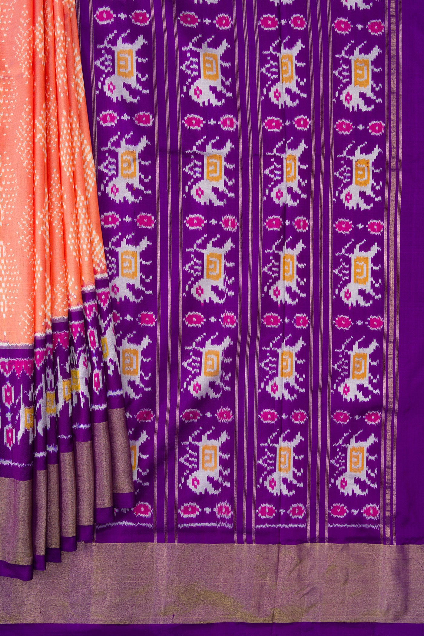 Pleats and pallu of Golden Peach Dual Tone Double Ikat Saree with Ikat Print on the body and Ikat Border. 