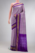 Grey Dual Tone Double Ikat Saree with Ikat Print on the body and Zari Border.  displayed on a mannequin