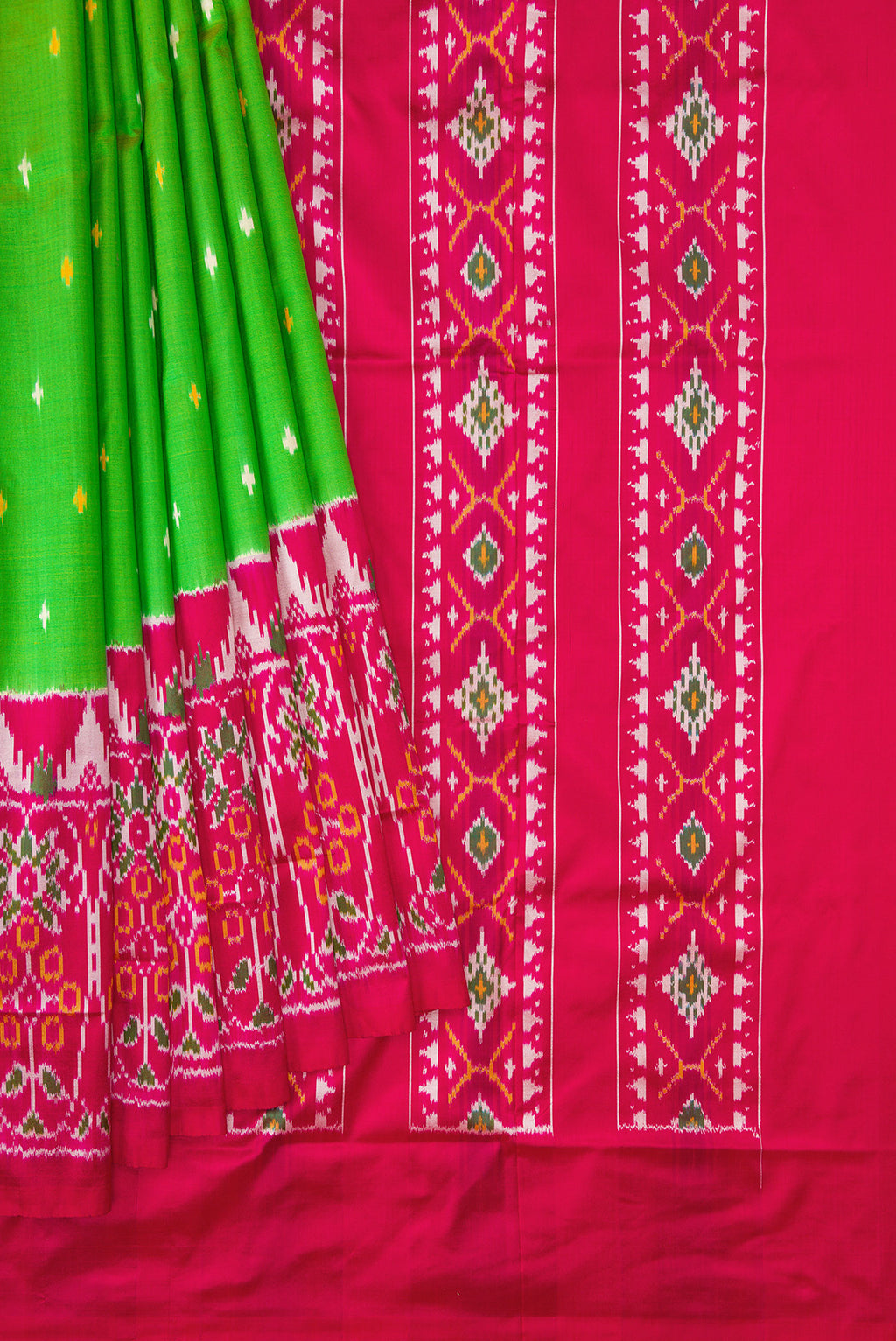 Pleats and pallu of Parrot Green Dual Tone Double Ikat Saree with Ikat Print on the body and Ikat Border. 