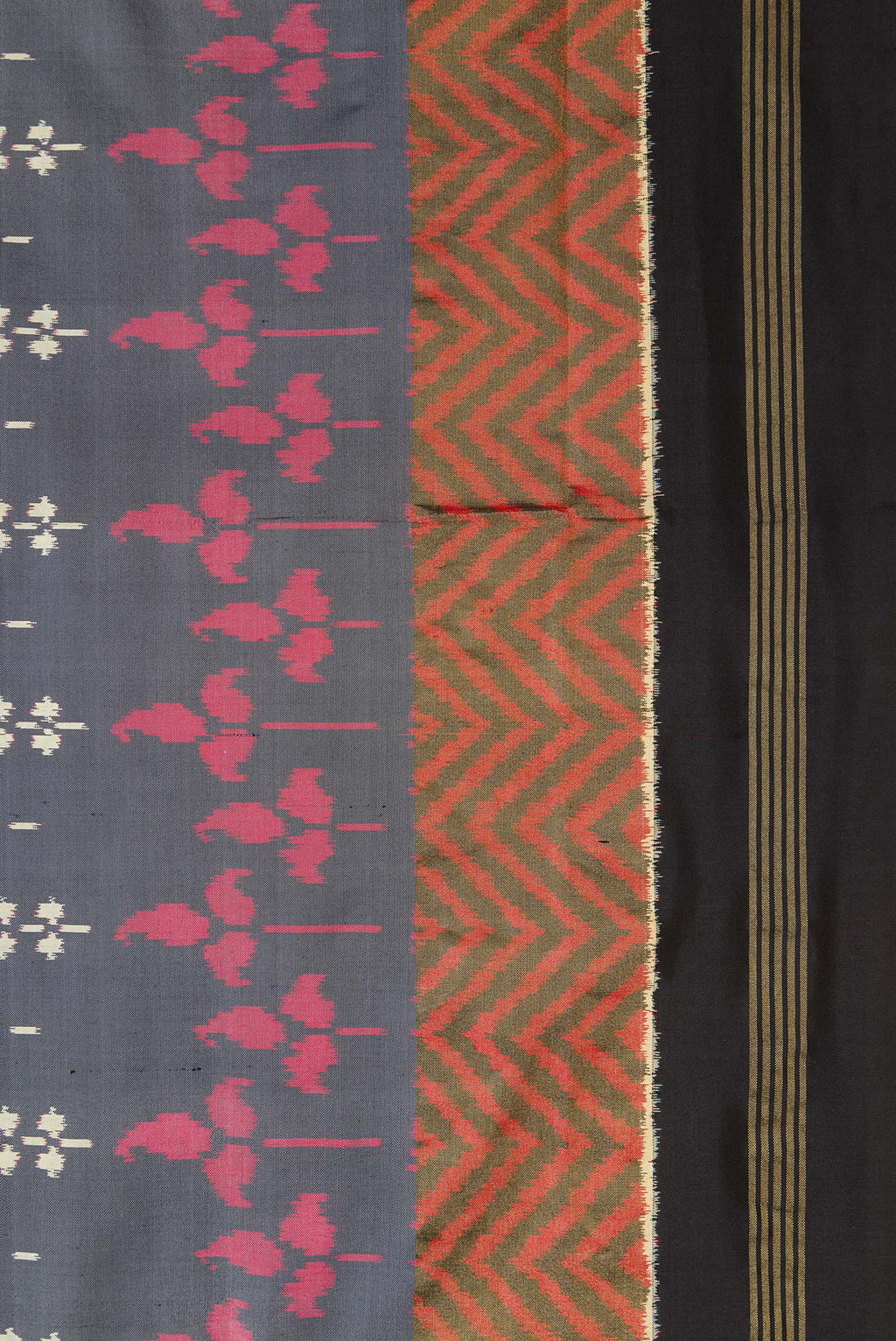 Border image of Grey Dual Tone Double Ikat Saree with Ikat Print on the body and Zari Border. 