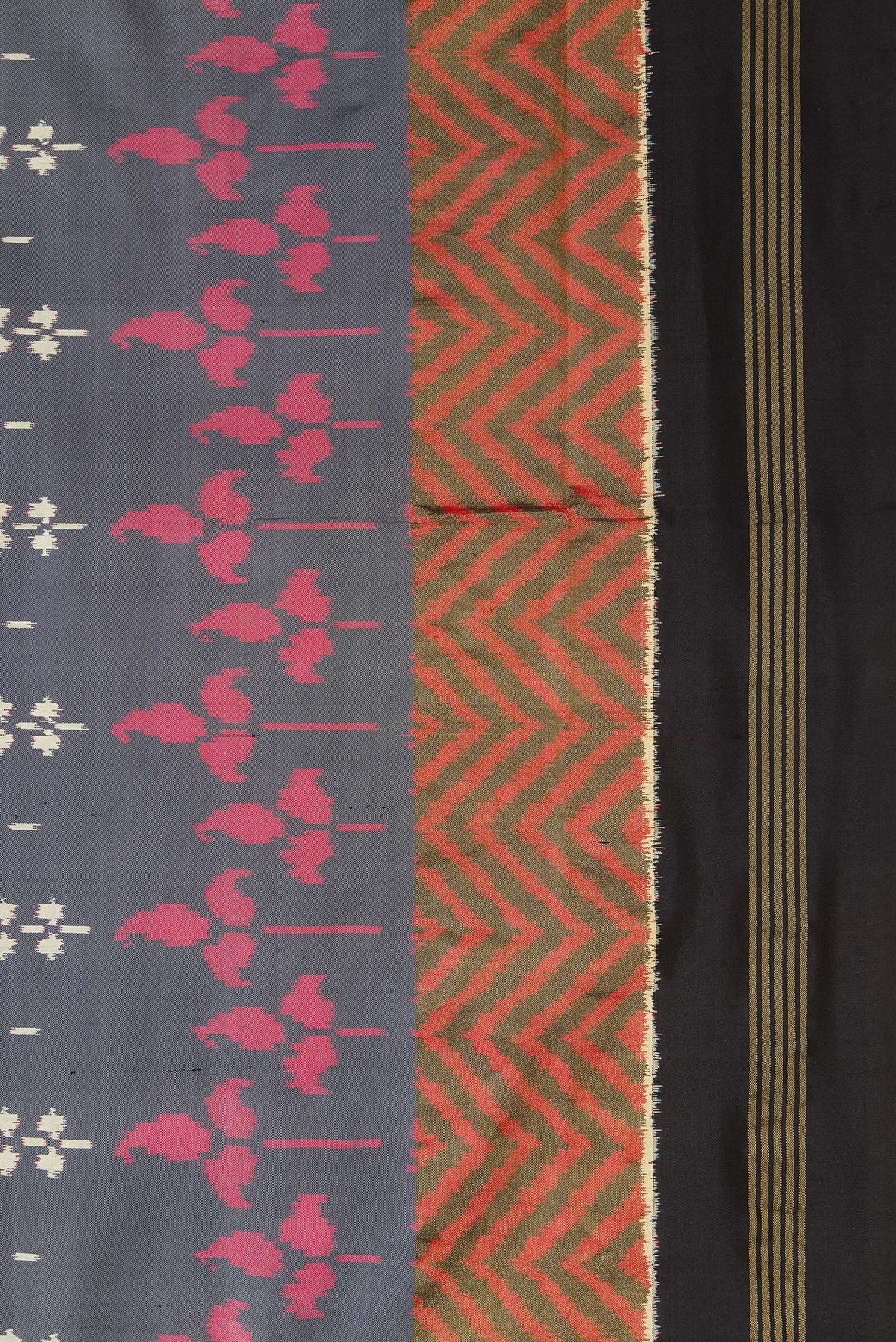 Border image of Grey Dual Tone Double Ikat Saree with Ikat Print on the body and Zari Border. 