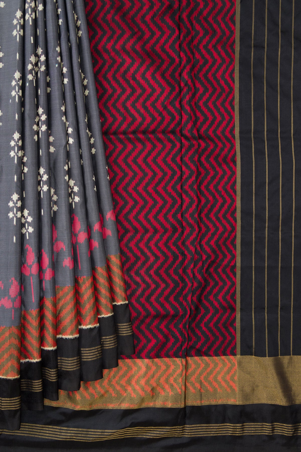 Pleats and pallu of Grey Dual Tone Double Ikat Saree with Ikat Print on the body and Zari Border. 
