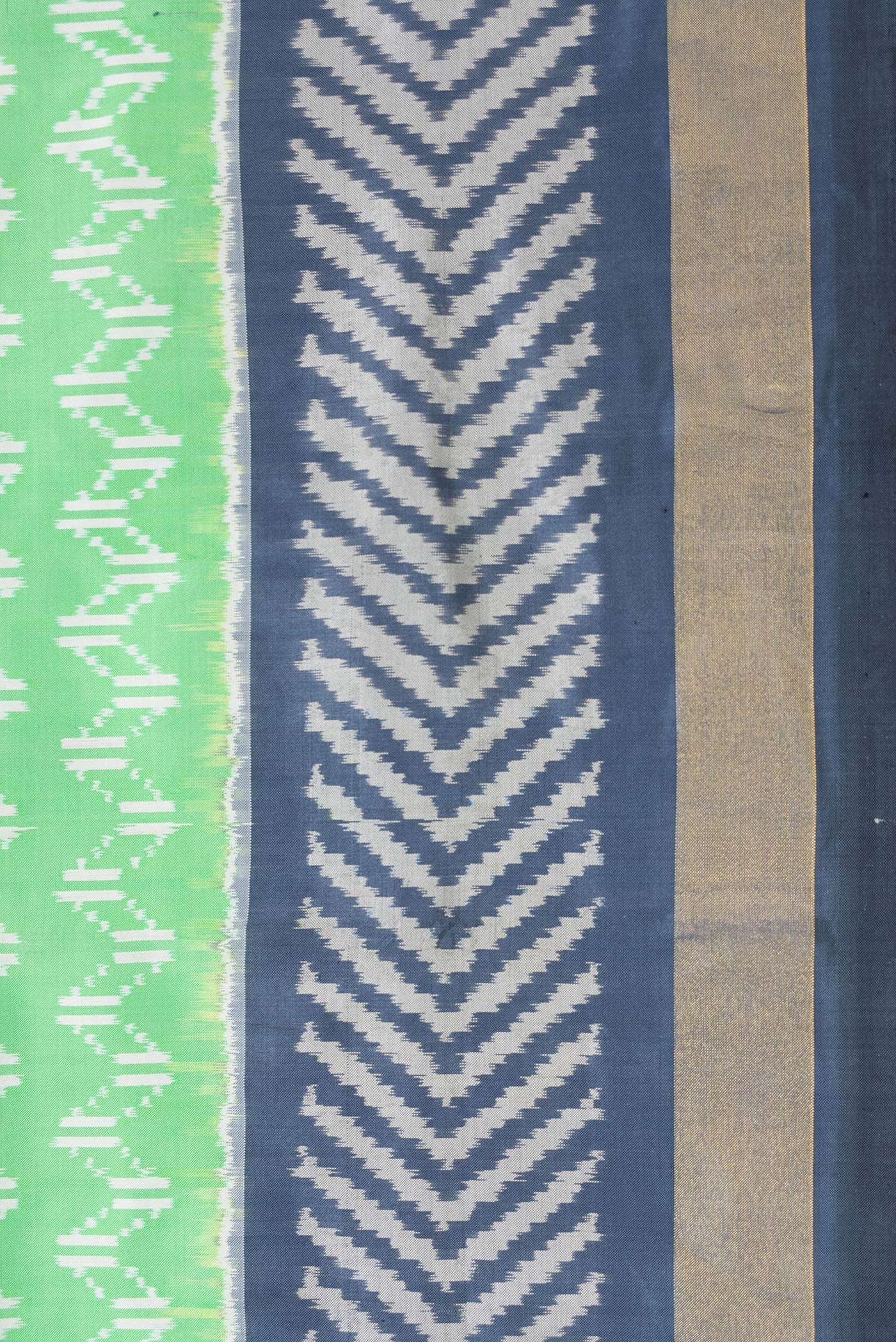 Border image of Pista Green Dual Tone Double Ikat Saree with Ikat Print on the body and Ikat Border. 