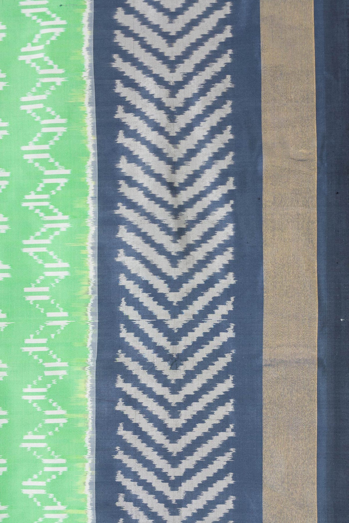 Border image of Pista Green Dual Tone Double Ikat Saree with Ikat Print on the body and Ikat Border. 