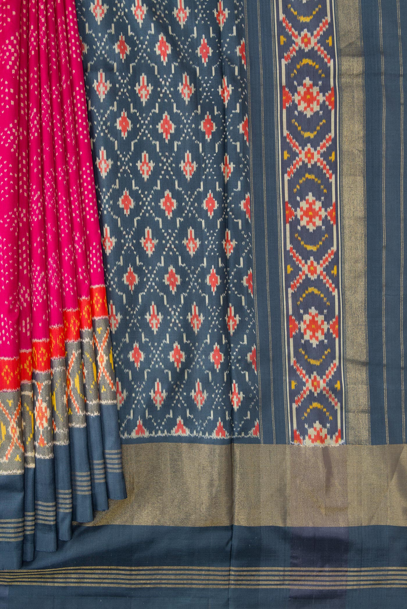 Pleats and pallu of Pink Dual Tone Double Ikat Saree with Ikat Print on the body and Ikat Border. 