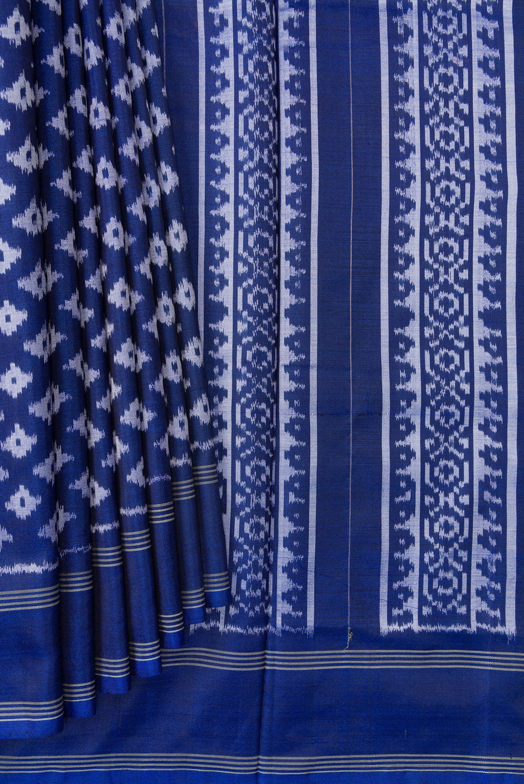 Pleats and pallu of Royal Blue Dual Tone Double Ikat Saree with Ikat Print on the body and Plain Border. 