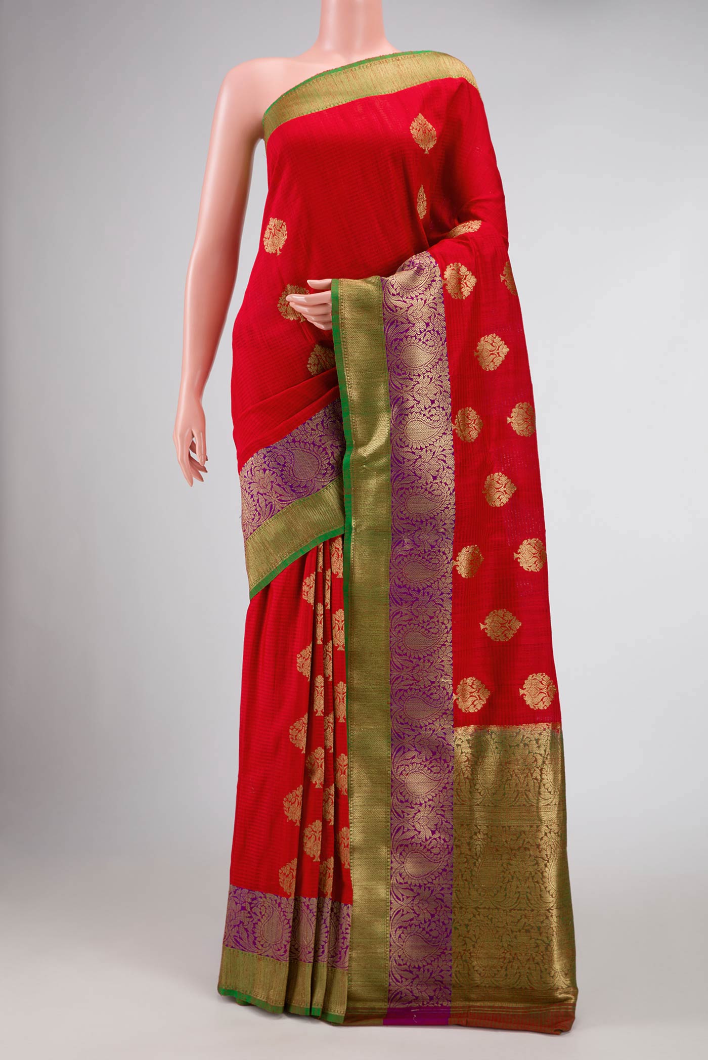 Red Banarasi Tussar Silk Saree with Zari Butta on the body and Zari Border displayed on a mannequin