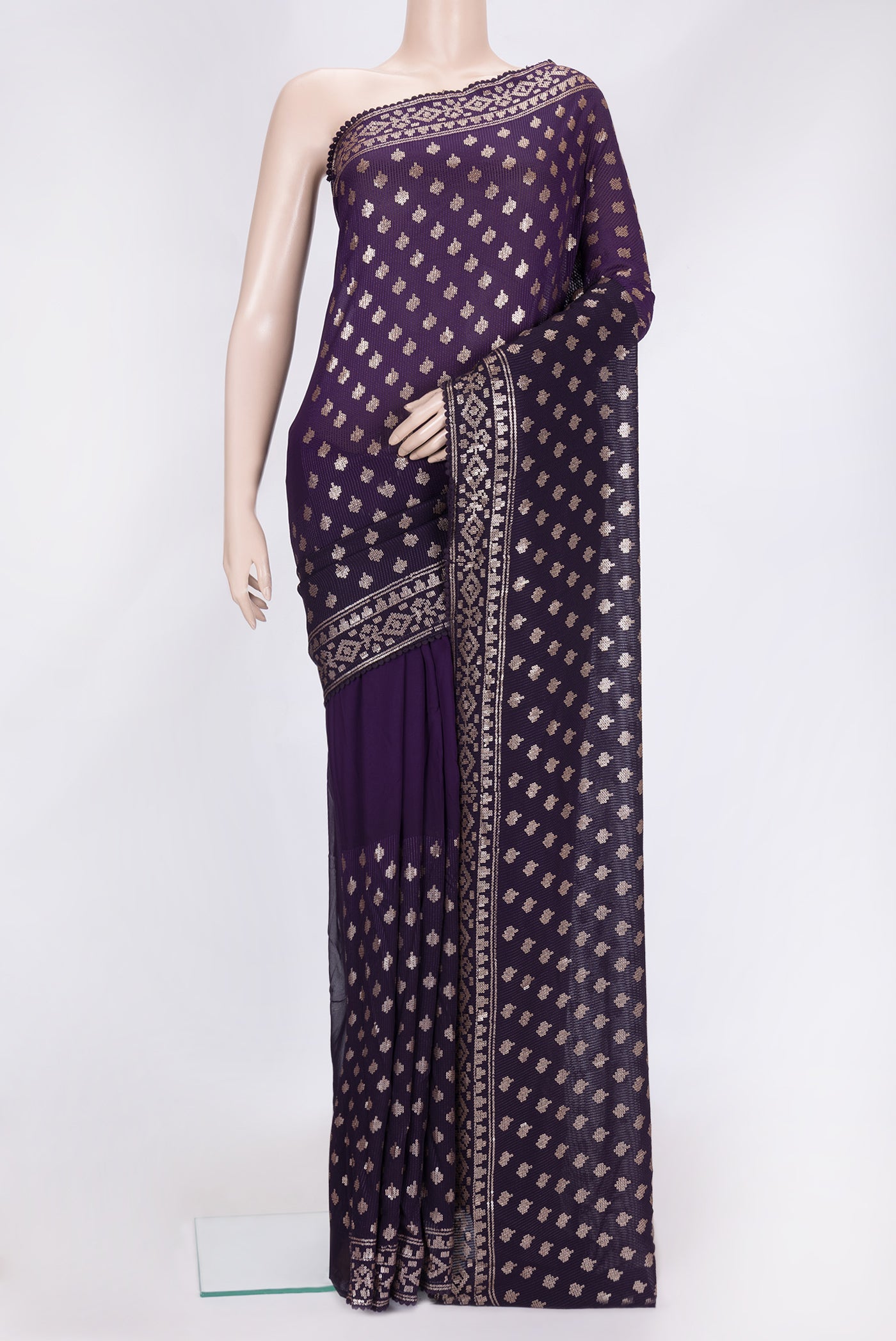 Violet Dual Tone Georgette Saree with Embroidery on the body and Embroidery Border.  displayed on a mannequin