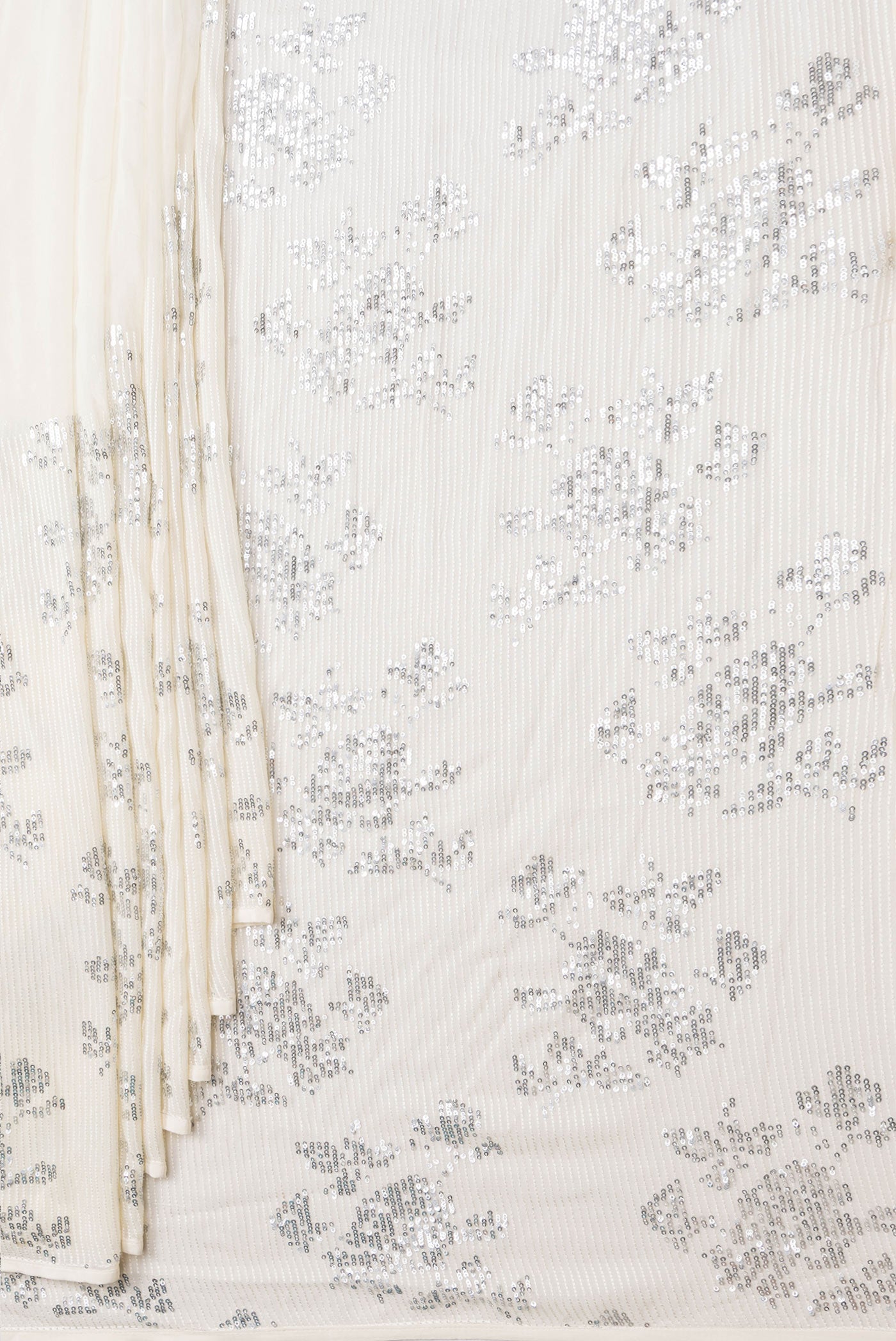 Pleats and pallu of Beige Dual Tone Mysore Georgette Saree with Embroidery on the body and Without Border. 