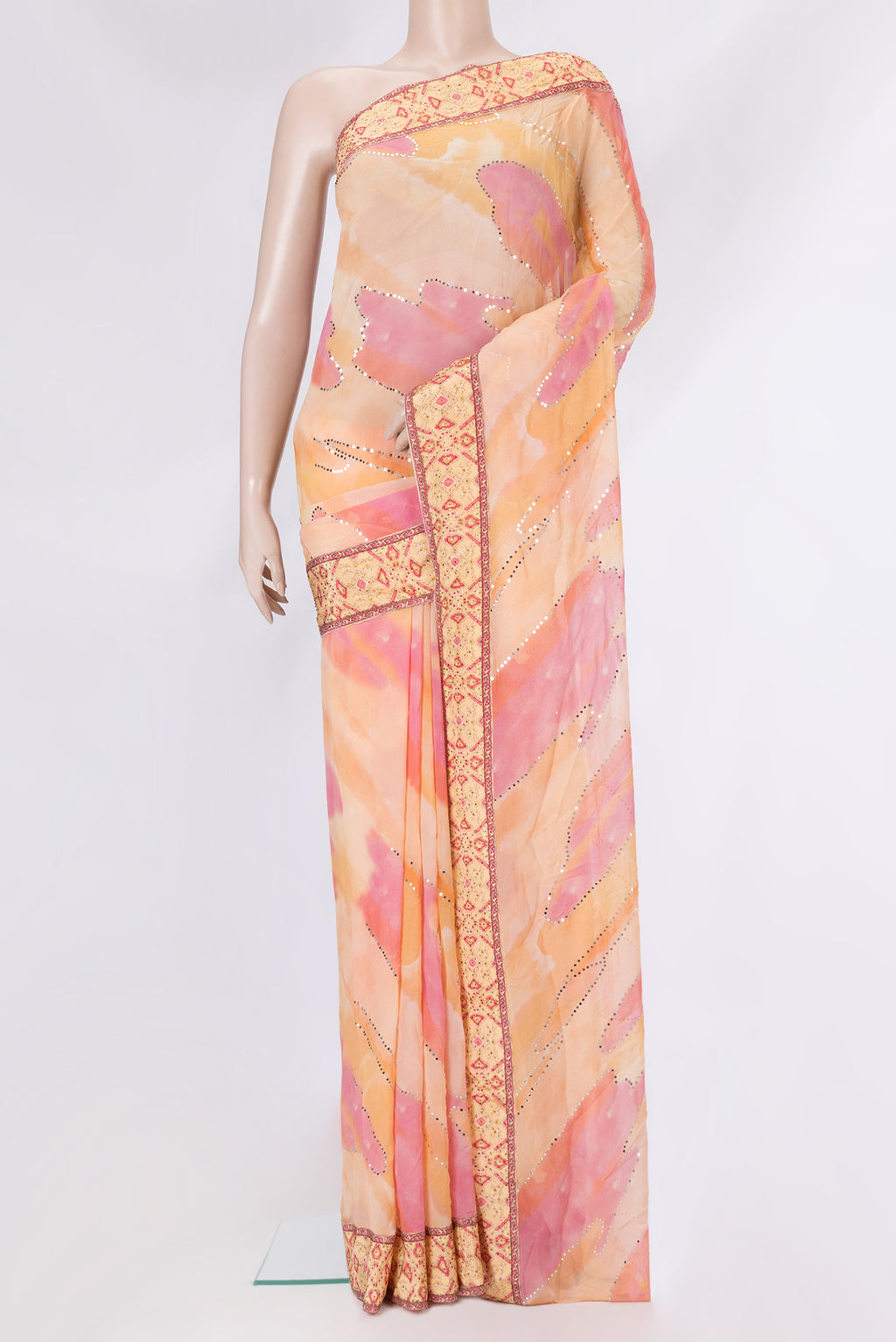 Peach Dual Tone Mysore Georgette Saree with Embroidery on the body and Embroidery Border.  displayed on a mannequin