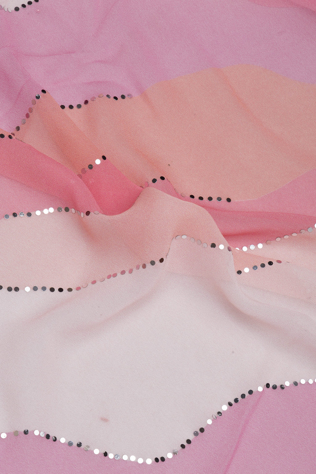 Close up of Multi Color Crepe Saree with Embroidery on the body and Embroidery Border.  displaying folds