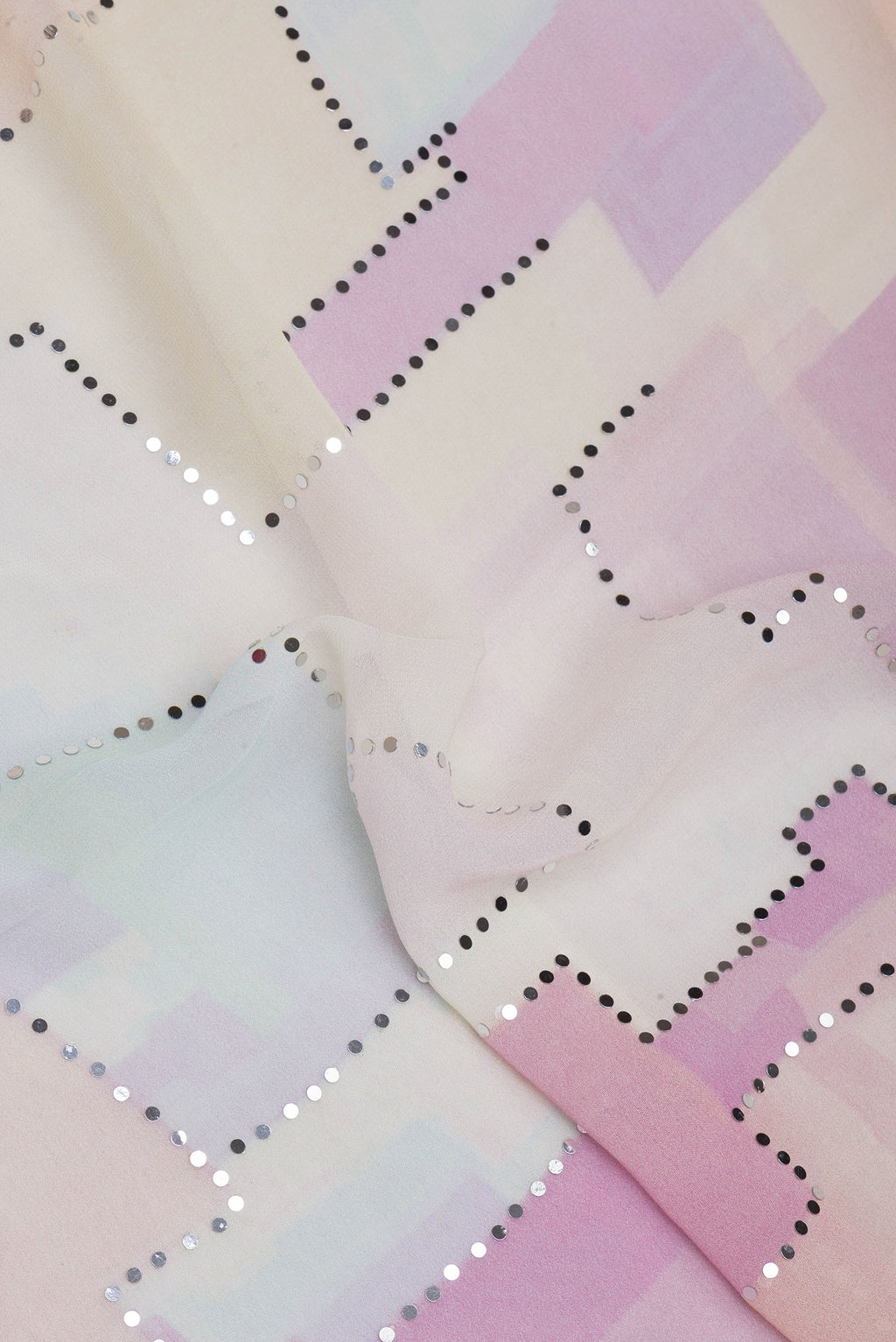 Close up of Sandal Georgette Saree with Embroidery on the body and Embroidery Border.  displaying folds