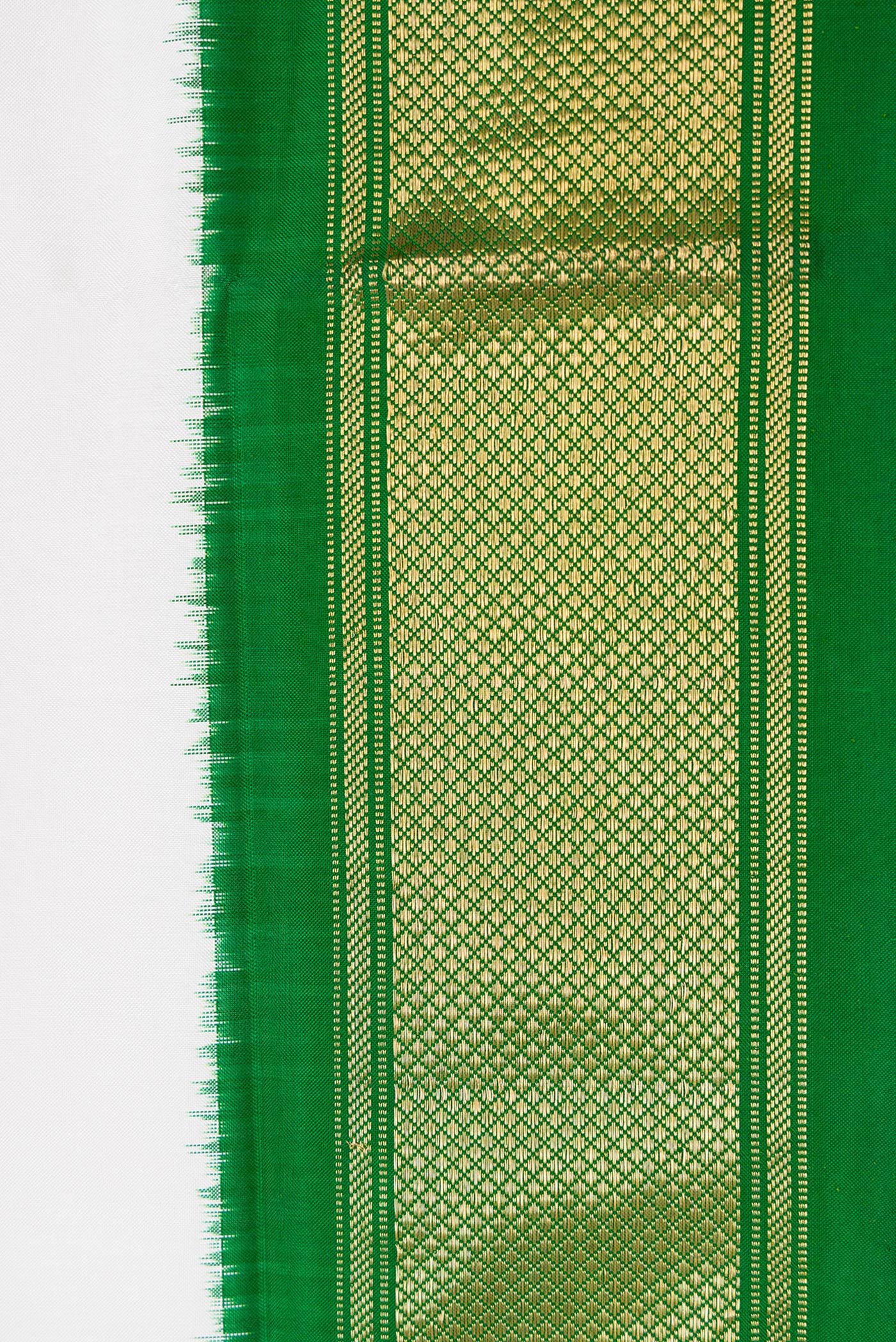 Border image of Off White Dual Tone Double Ikat Saree with Plain Body and Zari Border. 