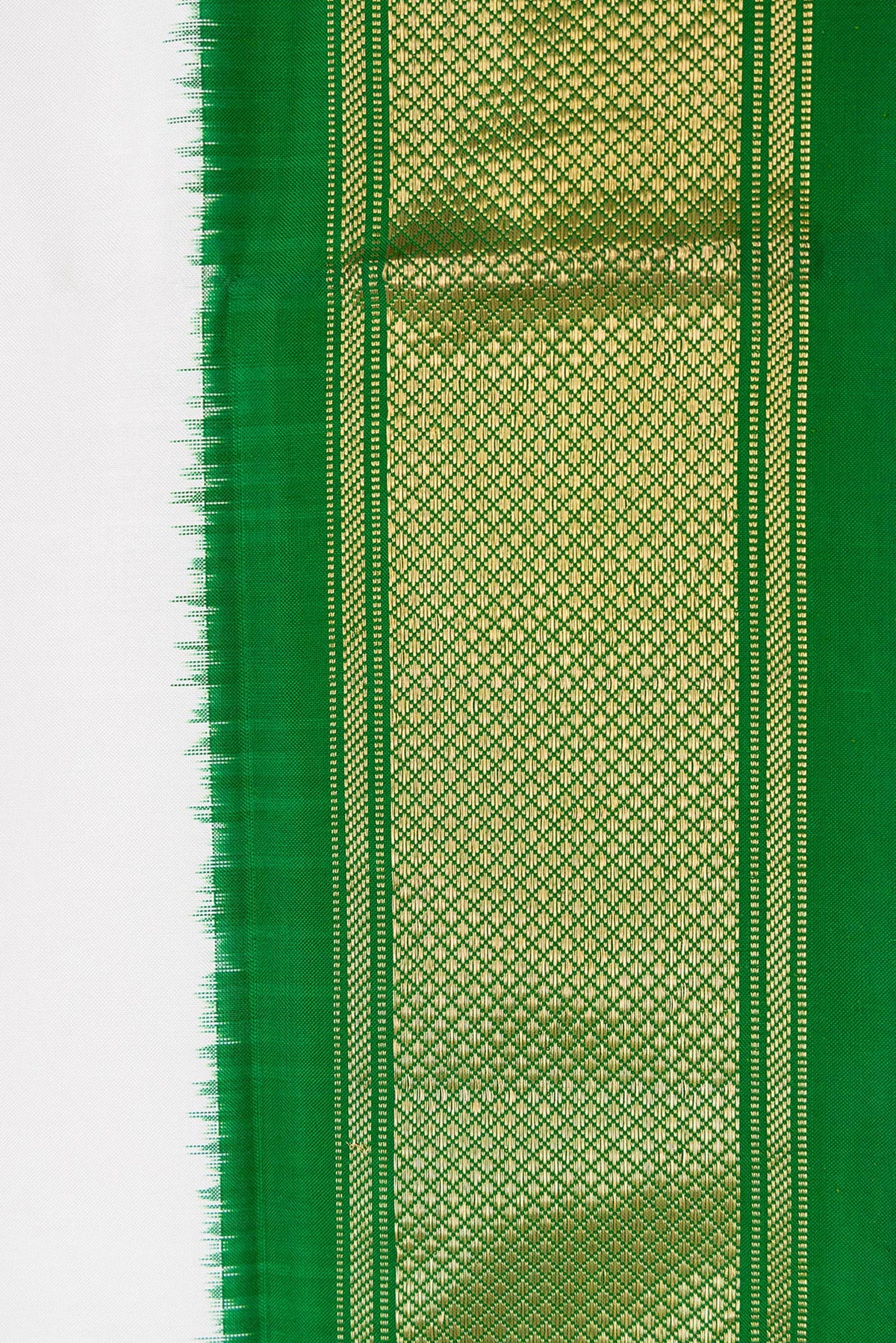 Border image of Off White Dual Tone Double Ikat Saree with Plain Body and Zari Border. 