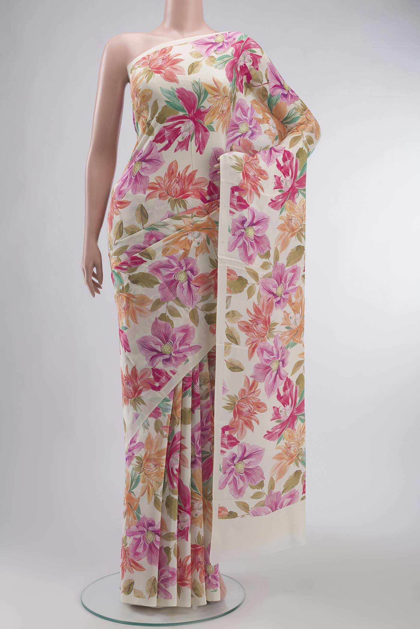 Cream Mysore Crepe Saree with Floral Print on the body and Without Border displayed on a mannequin