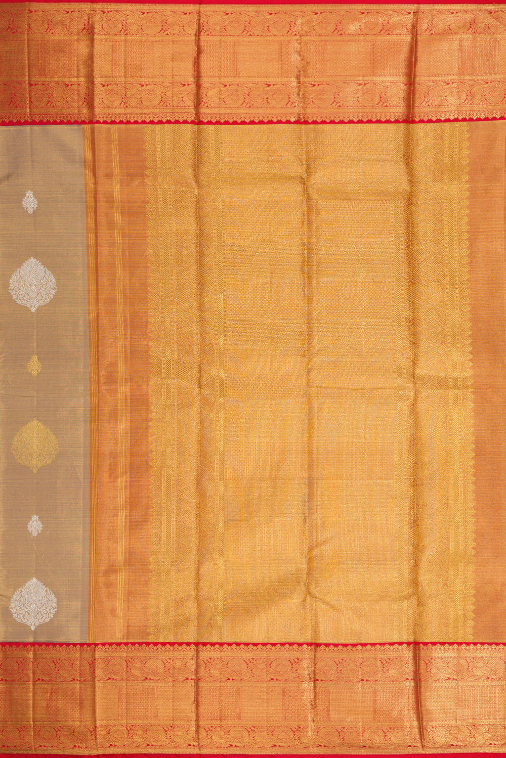Close up image of the pallu of Gold Dual Tone Kanjivaram Tissue Silk Saree with Zari Brocade on the body and Zari Border. 