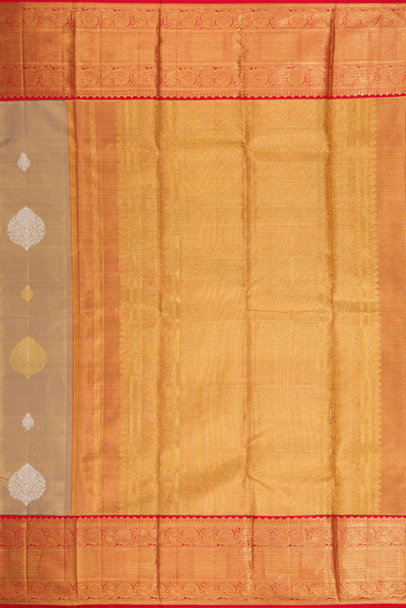 Close up image of the pallu of Gold Dual Tone Kanjivaram Tissue Silk Saree with Zari Brocade on the body and Zari Border. 