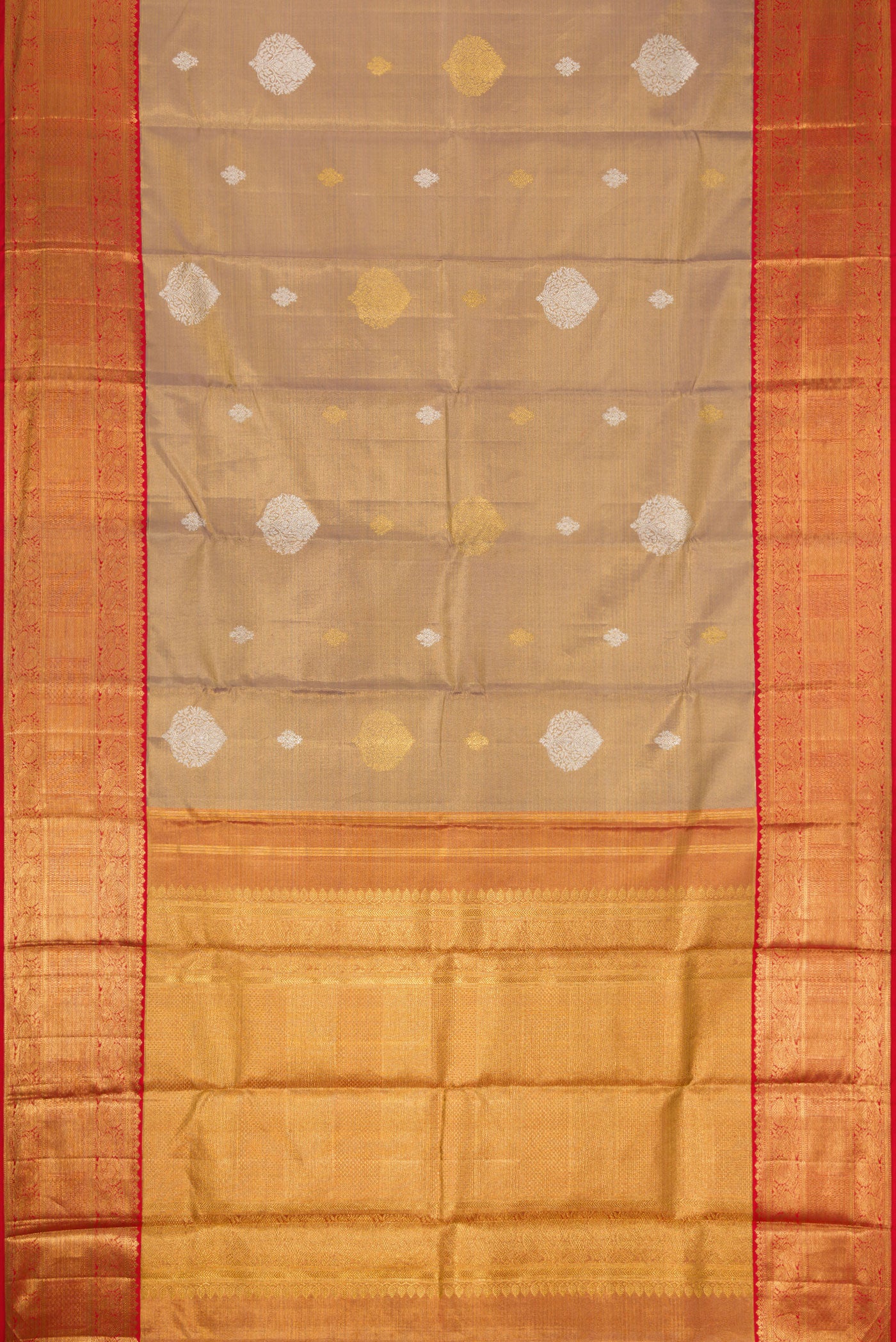 Flat view of Gold Dual Tone Kanjivaram Tissue Silk Saree with Zari Brocade on the body and Zari Border. 