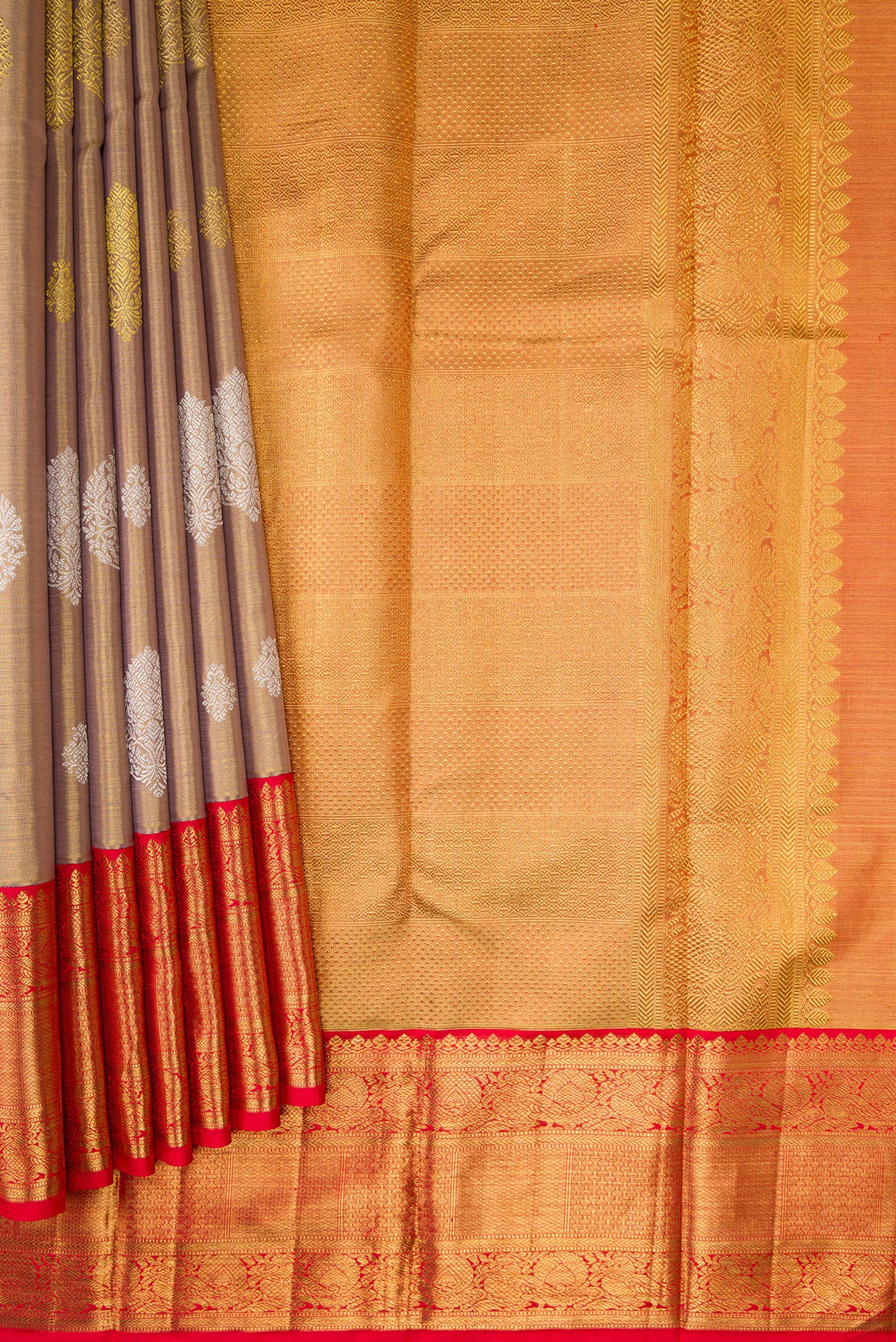 Pleats and pallu of Gold Dual Tone Kanjivaram Tissue Silk Saree with Zari Brocade on the body and Zari Border. 