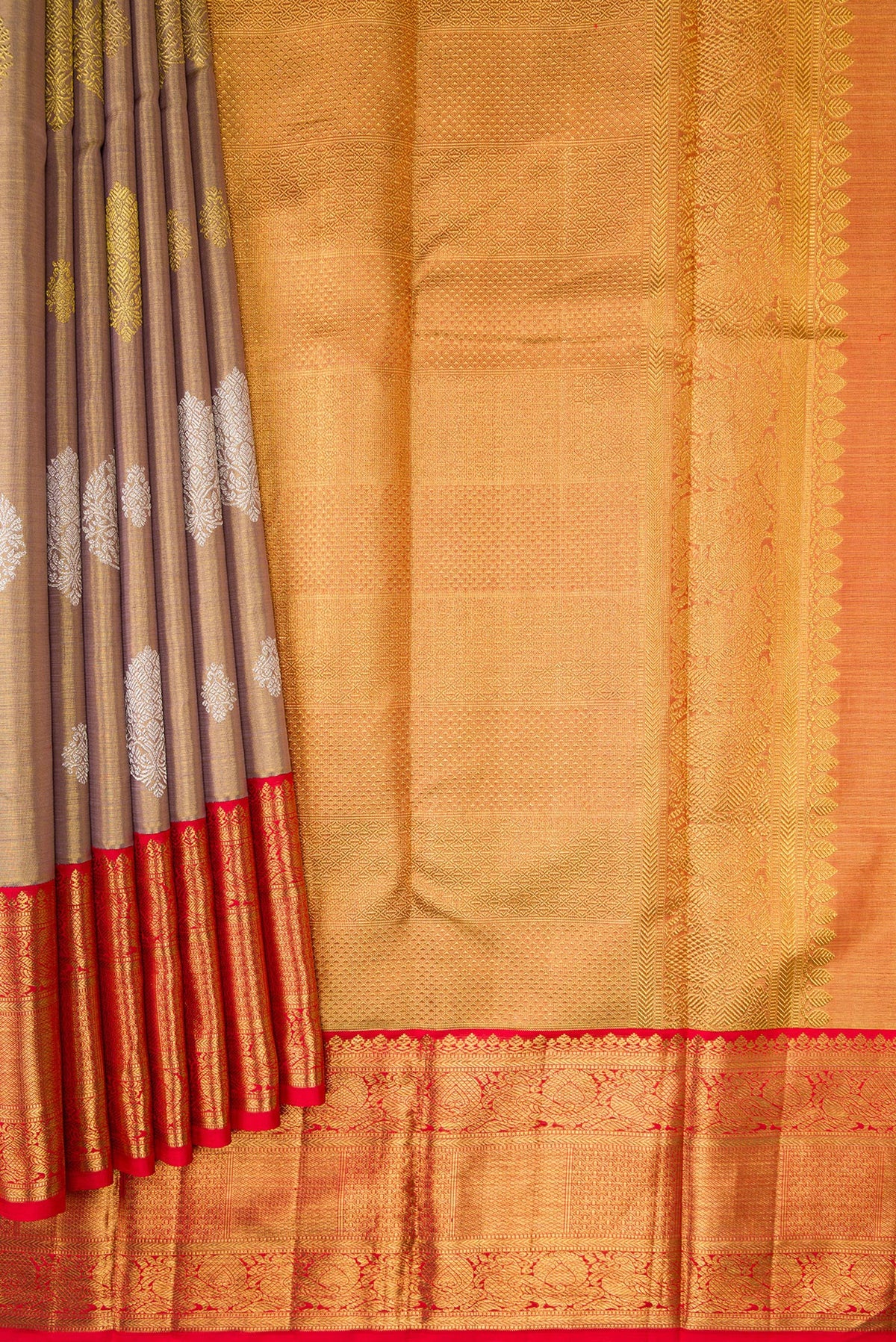 Pleats and pallu of Gold Dual Tone Kanjivaram Tissue Silk Saree with Zari Brocade on the body and Zari Border. 