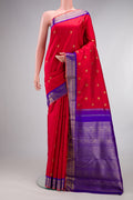 Pure Silk Pure Zari Red Kanjivaram Saree with Zari Butta on the body and Fancy Border.  displayed on a mannequin