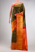 Black Dual Tone Kanjivaram Silk Saree with Zari Brocade on the body and Zari Border.  displayed on a mannequin