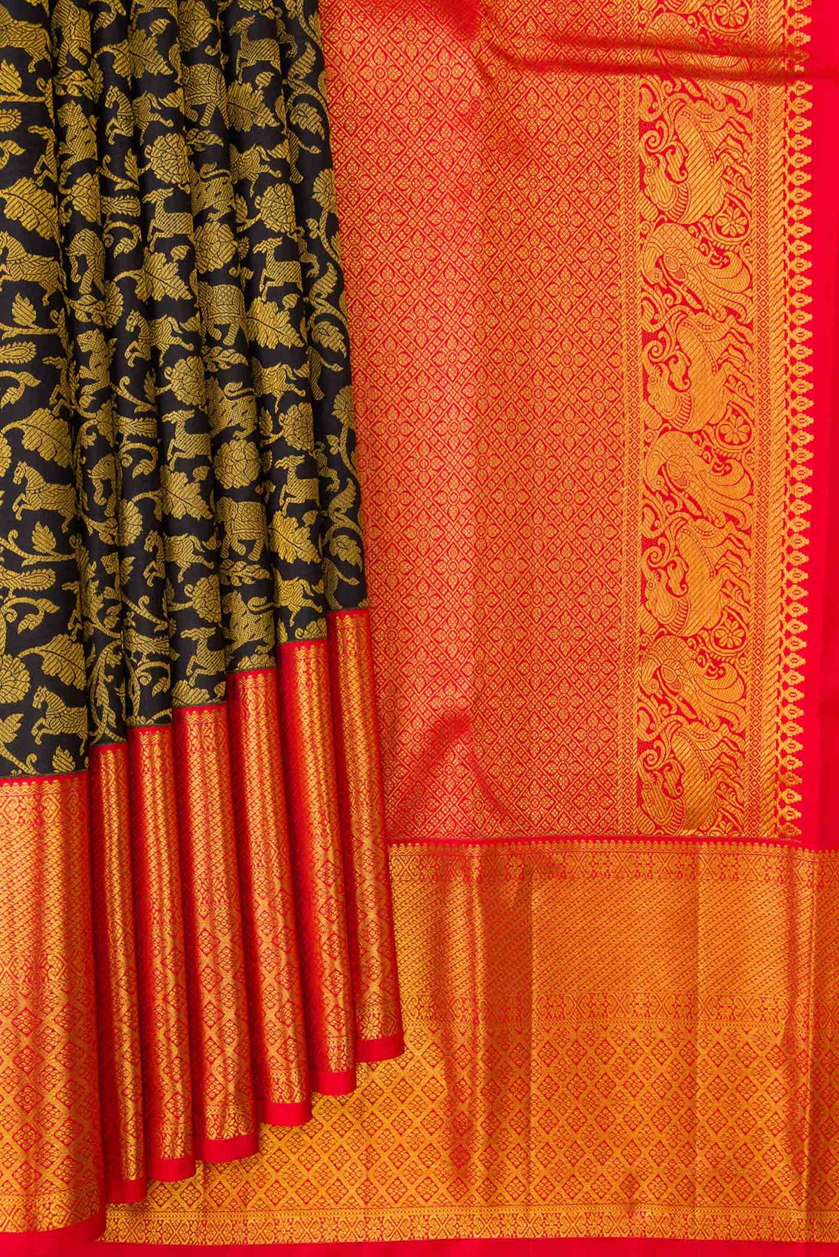 Pleats and pallu of Black Dual Tone Kanjivaram Silk Saree with Zari Brocade on the body and Zari Border. 