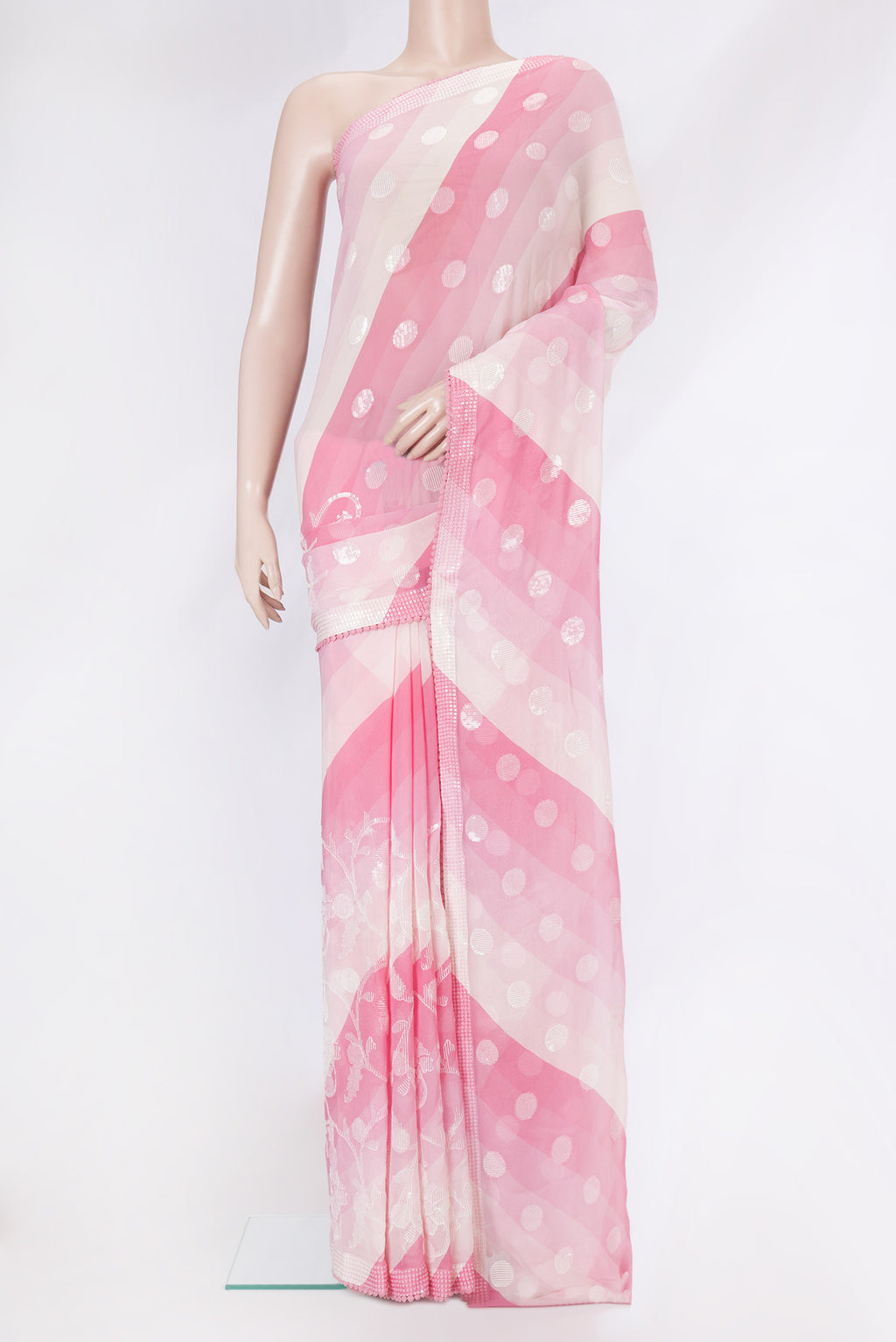 Pink Dual Tone Georgette Saree with Embroidery on the body and Embroidery Border.  displayed on a mannequin