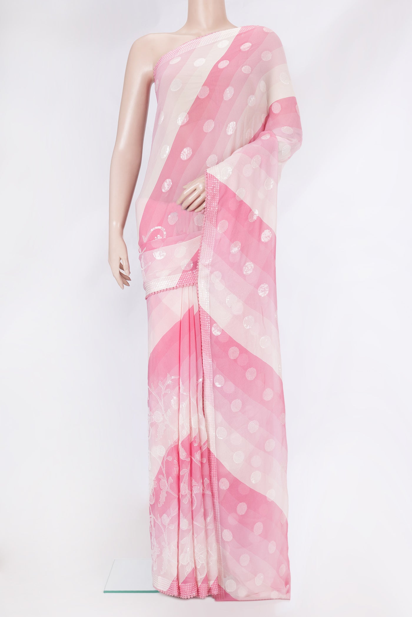 Pink Dual Tone Georgette Saree with Embroidery on the body and Embroidery Border.  displayed on a mannequin