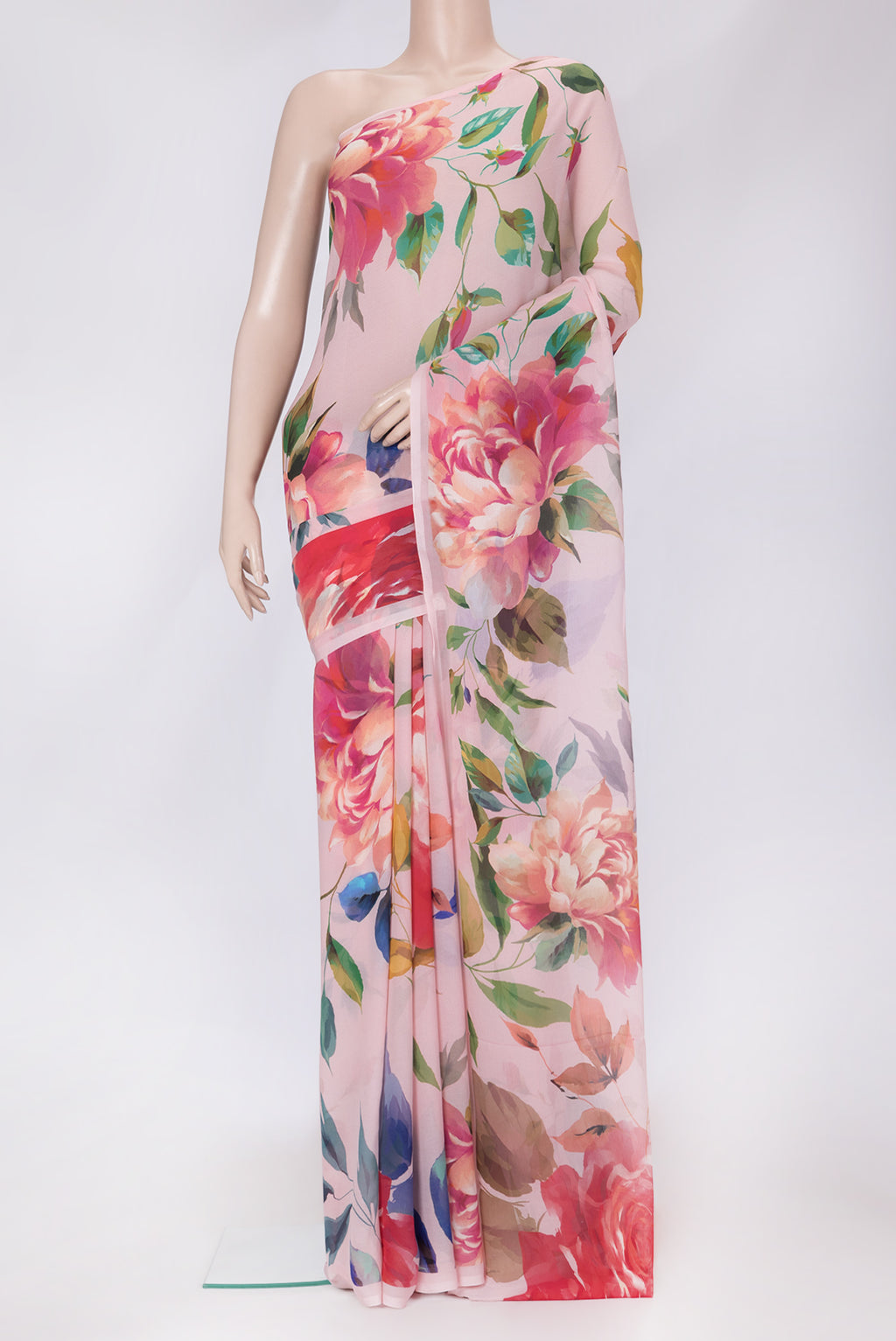 Golden Peach Dual Tone Mysore Chiffon Saree with Printed design on the body and Without Border.  displayed on a mannequin