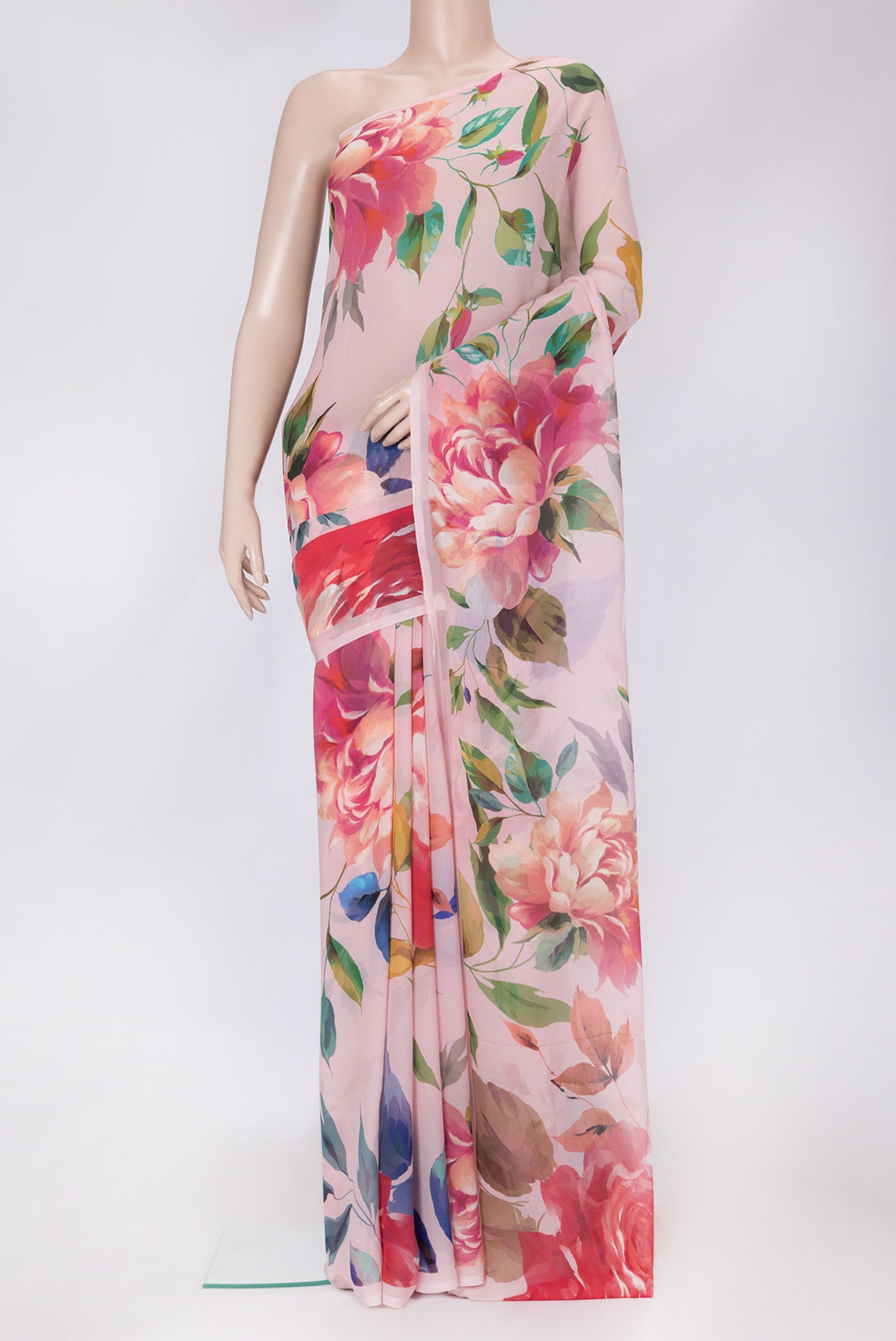 Golden Peach Dual Tone Mysore Chiffon Saree with Printed design on the body and Without Border.  displayed on a mannequin