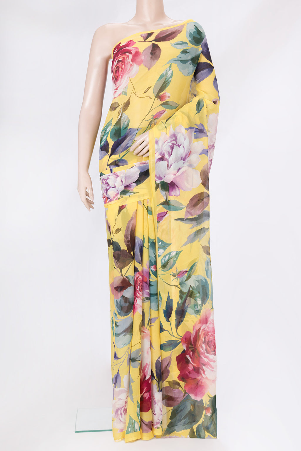Yellow Mysore Chiffon Saree with Printed design on the body and Without Border.  displayed on a mannequin