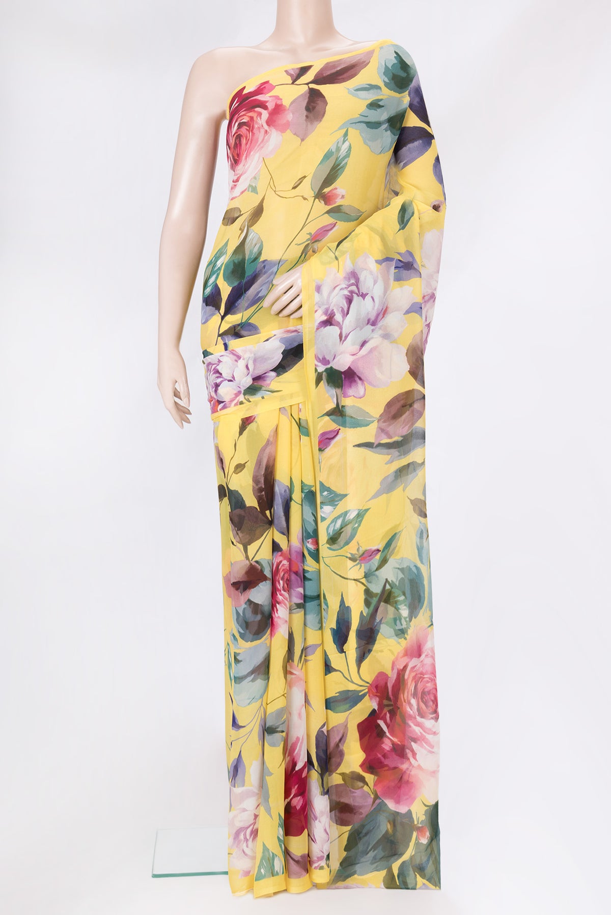 Yellow Mysore Chiffon Saree with Printed design on the body and Without Border.  displayed on a mannequin