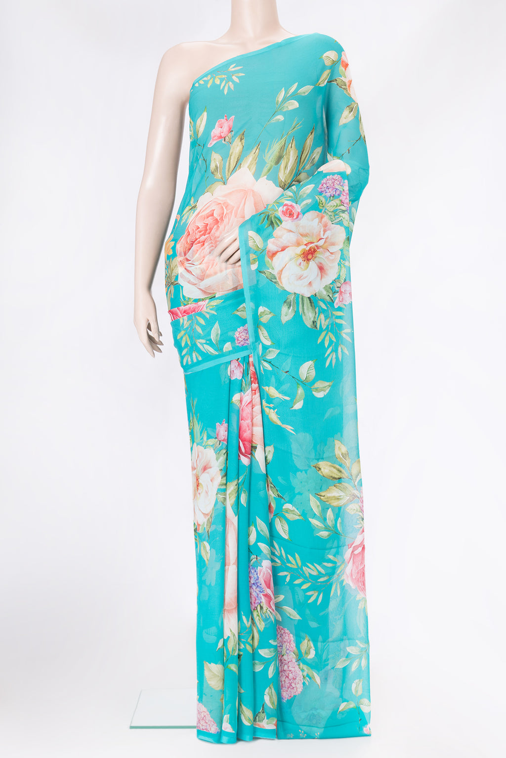 Sky Blue Mysore Chiffon Saree with Printed design on the body and Without Border.  displayed on a mannequin