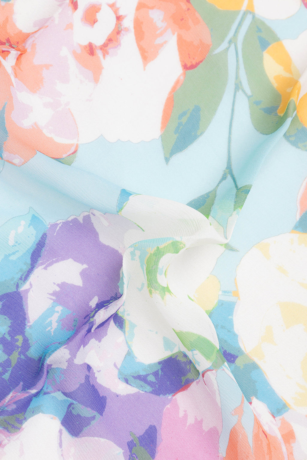 Close up of Light Blue Mysore Chiffon Saree with Printed design on the body and Plain Border.  displaying folds