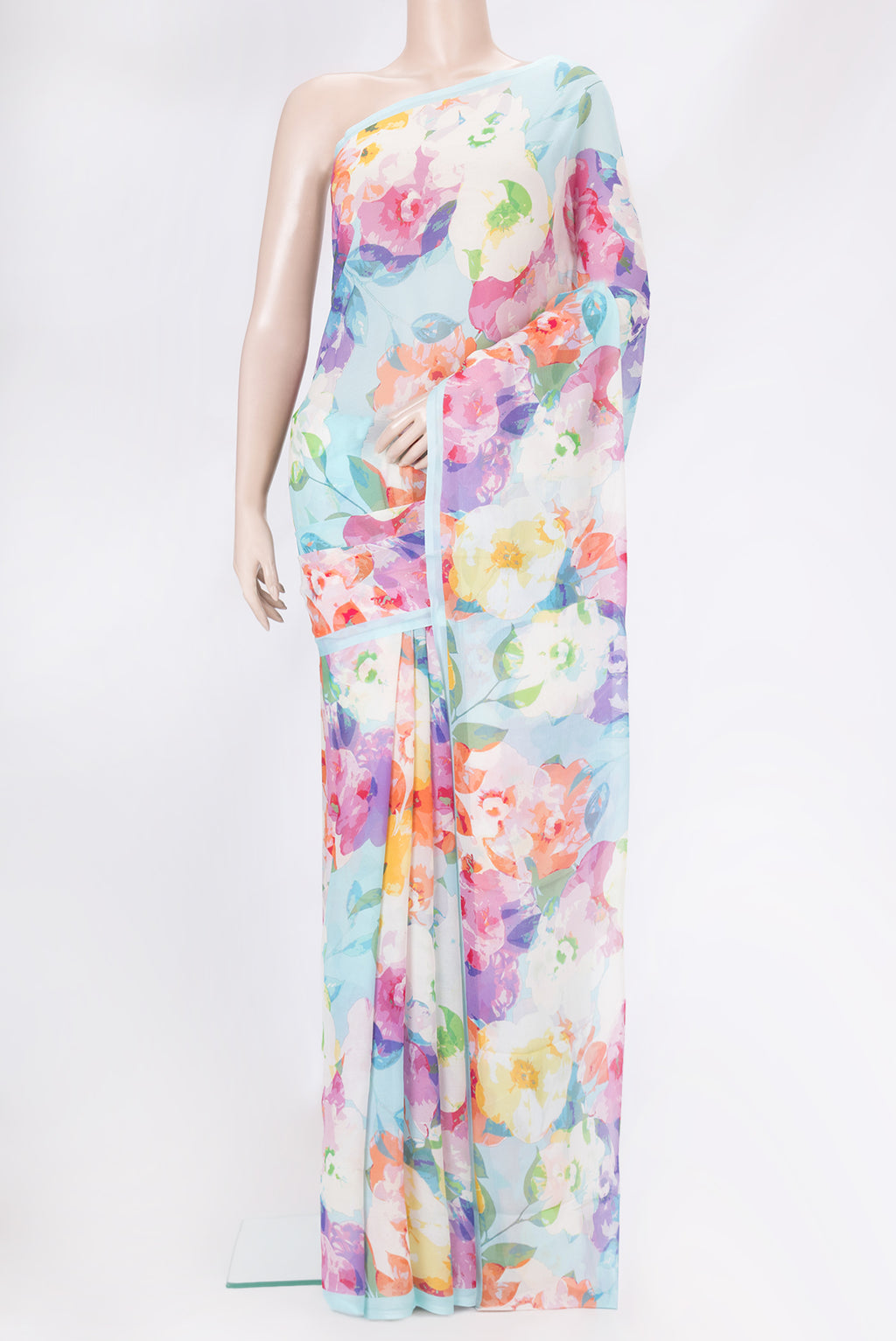 Light Blue Mysore Chiffon Saree with Printed design on the body and Plain Border.  displayed on a mannequin