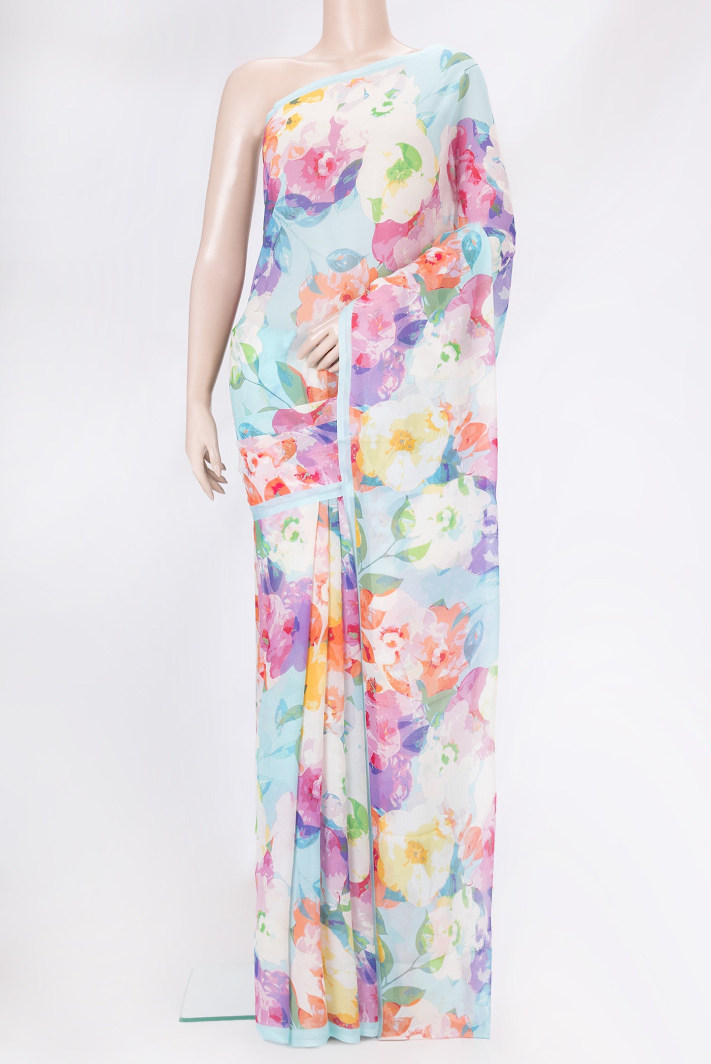 Light Blue Mysore Chiffon Saree with Printed design on the body and Plain Border.  displayed on a mannequin