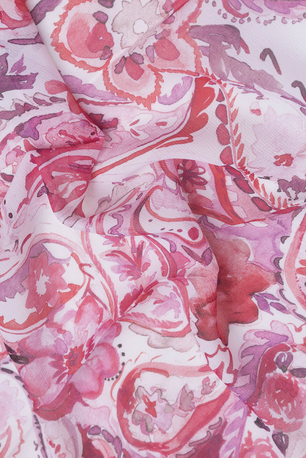 Close up of Rose Gold Mysore Chiffon Saree with Printed design on the body and Without Border.  displaying folds