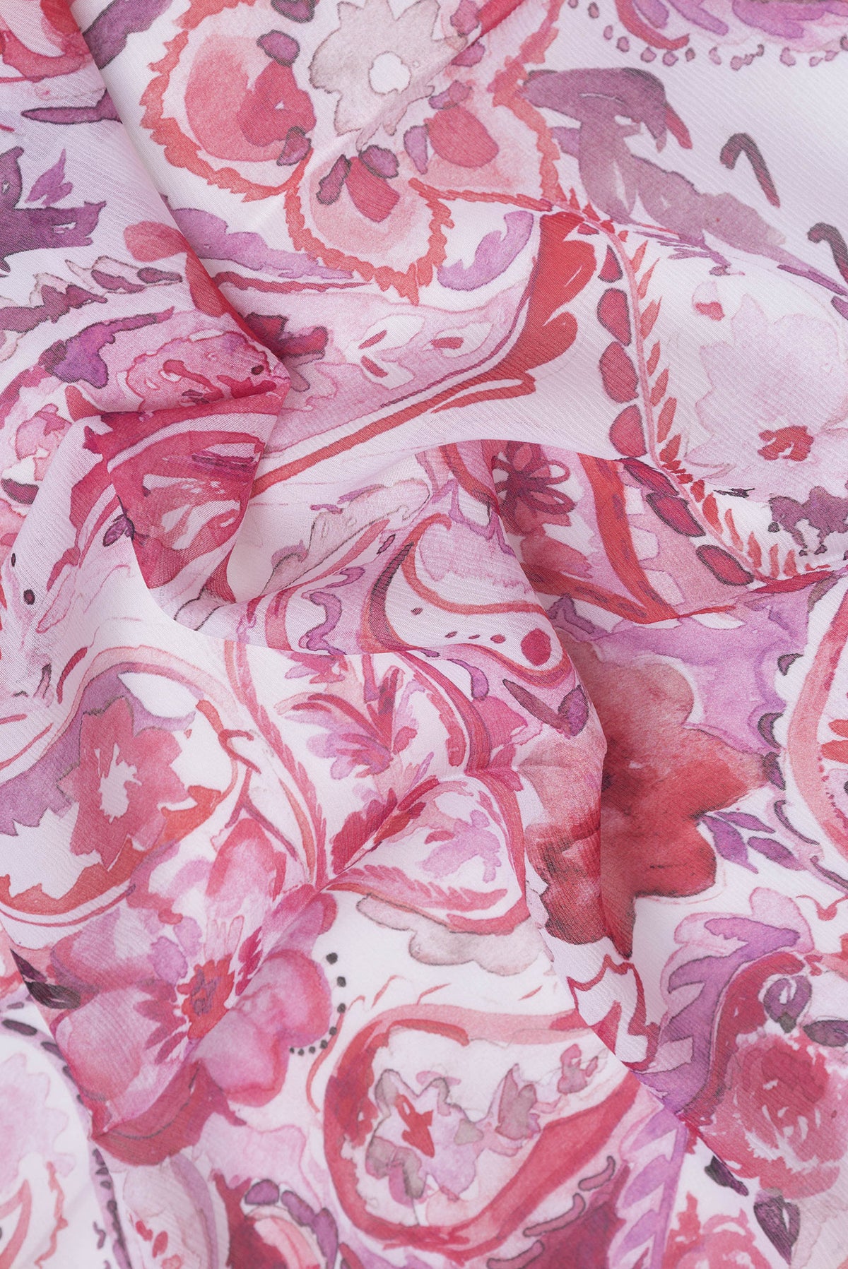 Close up of Rose Gold Mysore Chiffon Saree with Printed design on the body and Without Border.  displaying folds